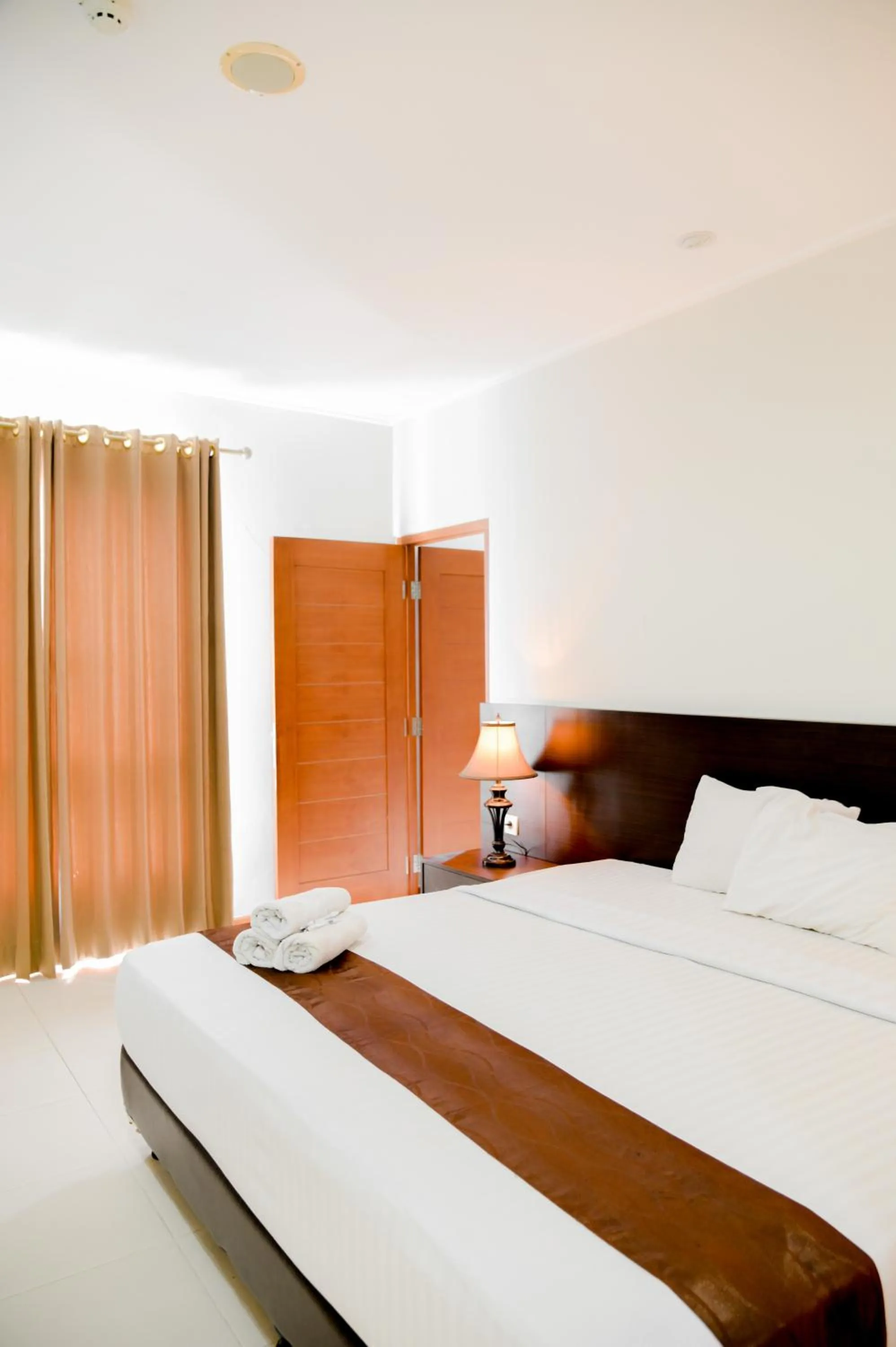 Bed in Hotel Bonero Residence