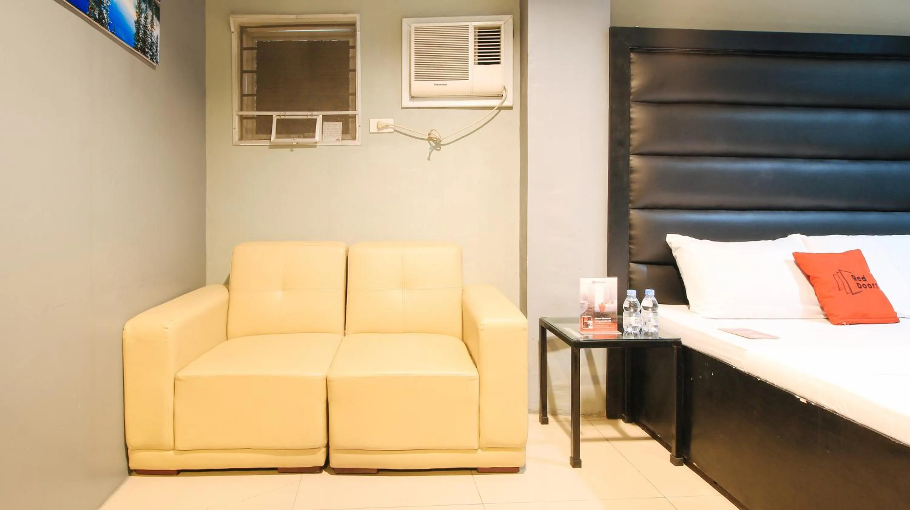 Living room, Bed in RedDoorz @ P Florentino Street Sampaloc Manila
