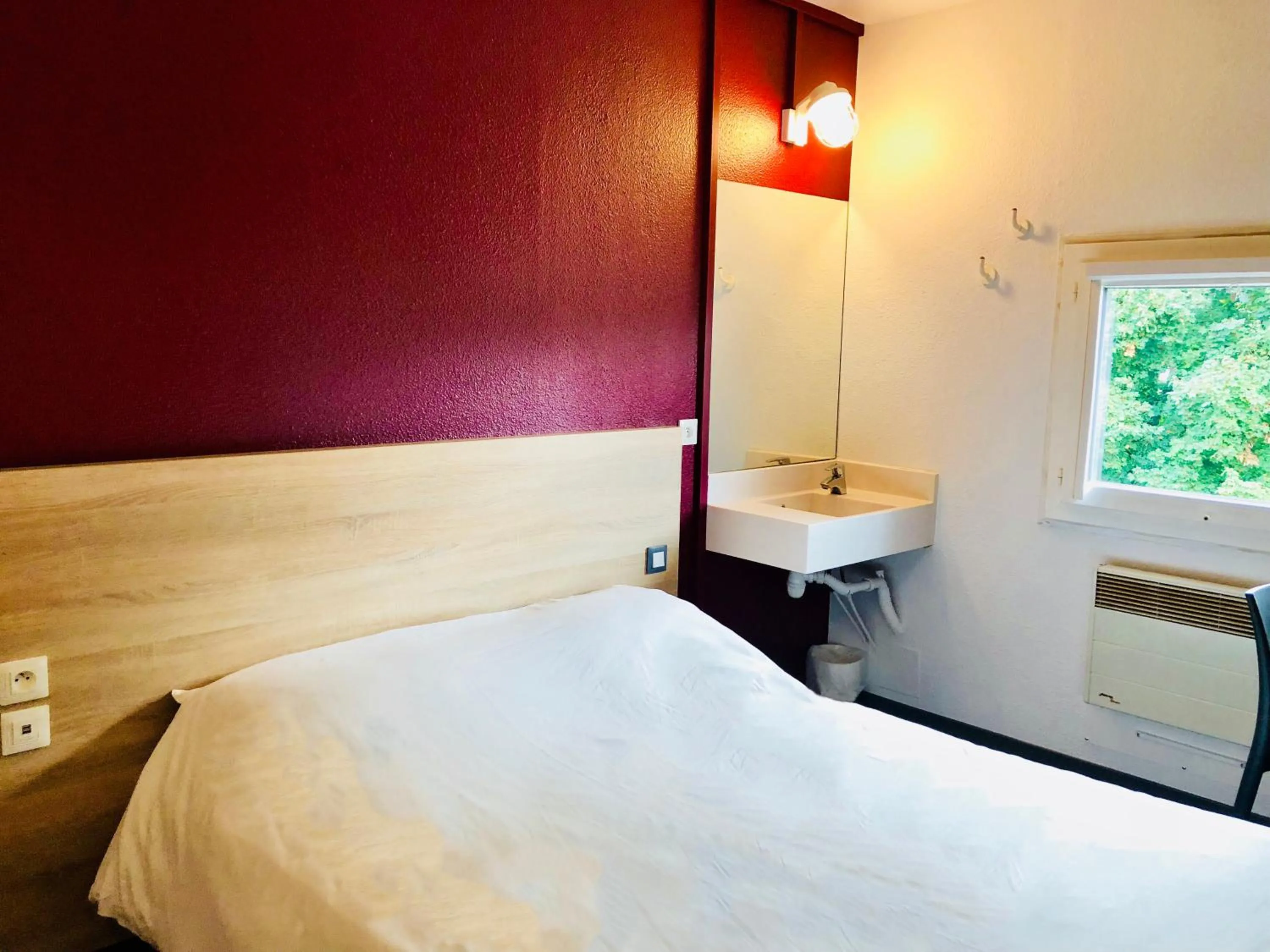 Bed in hotelF1 Genève Aéroport Ferney