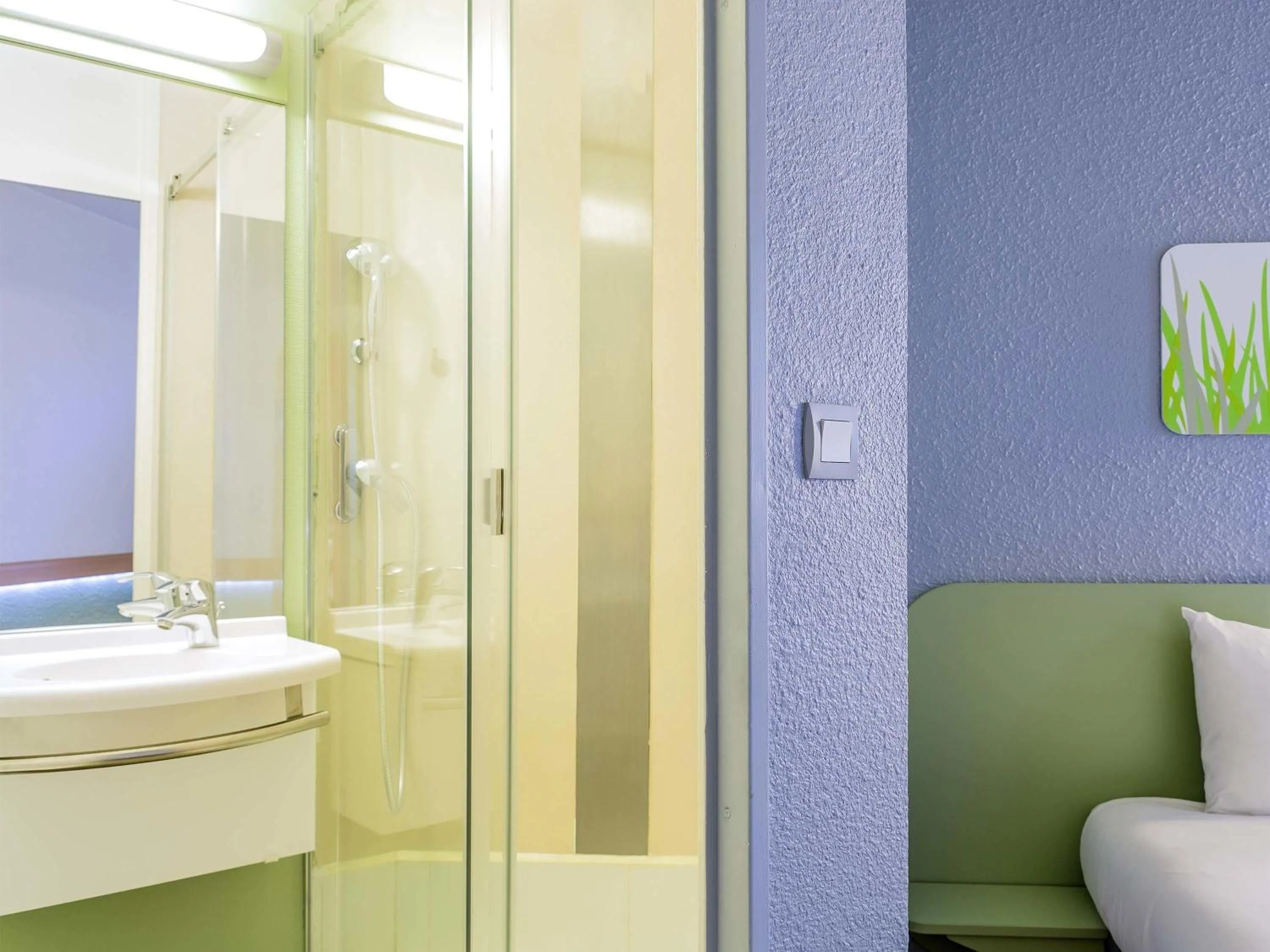 Bedroom in Hôtel Ibis Budget Nantes Nord St Herblain