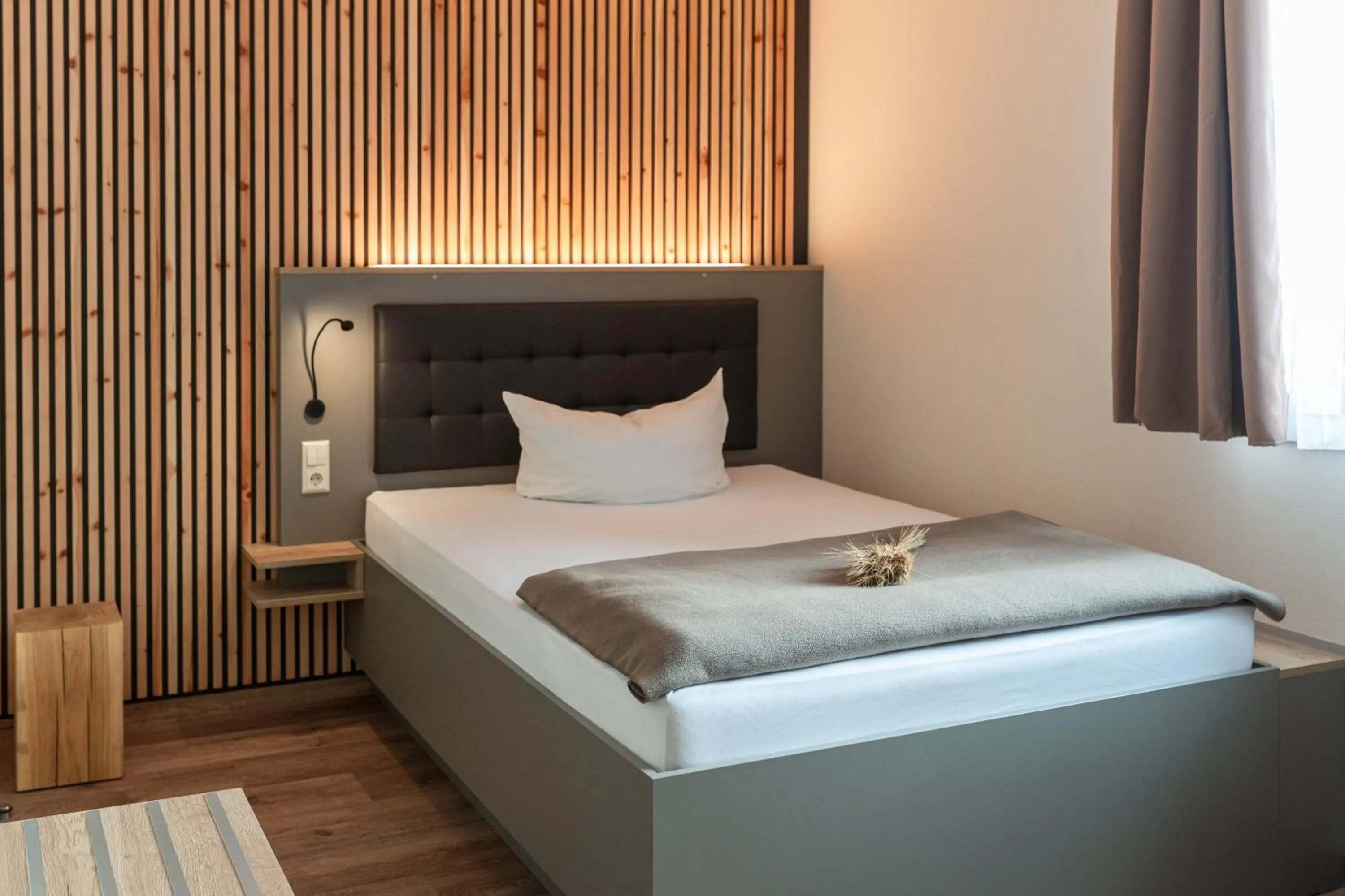 Bed in Hotel in der Mühle