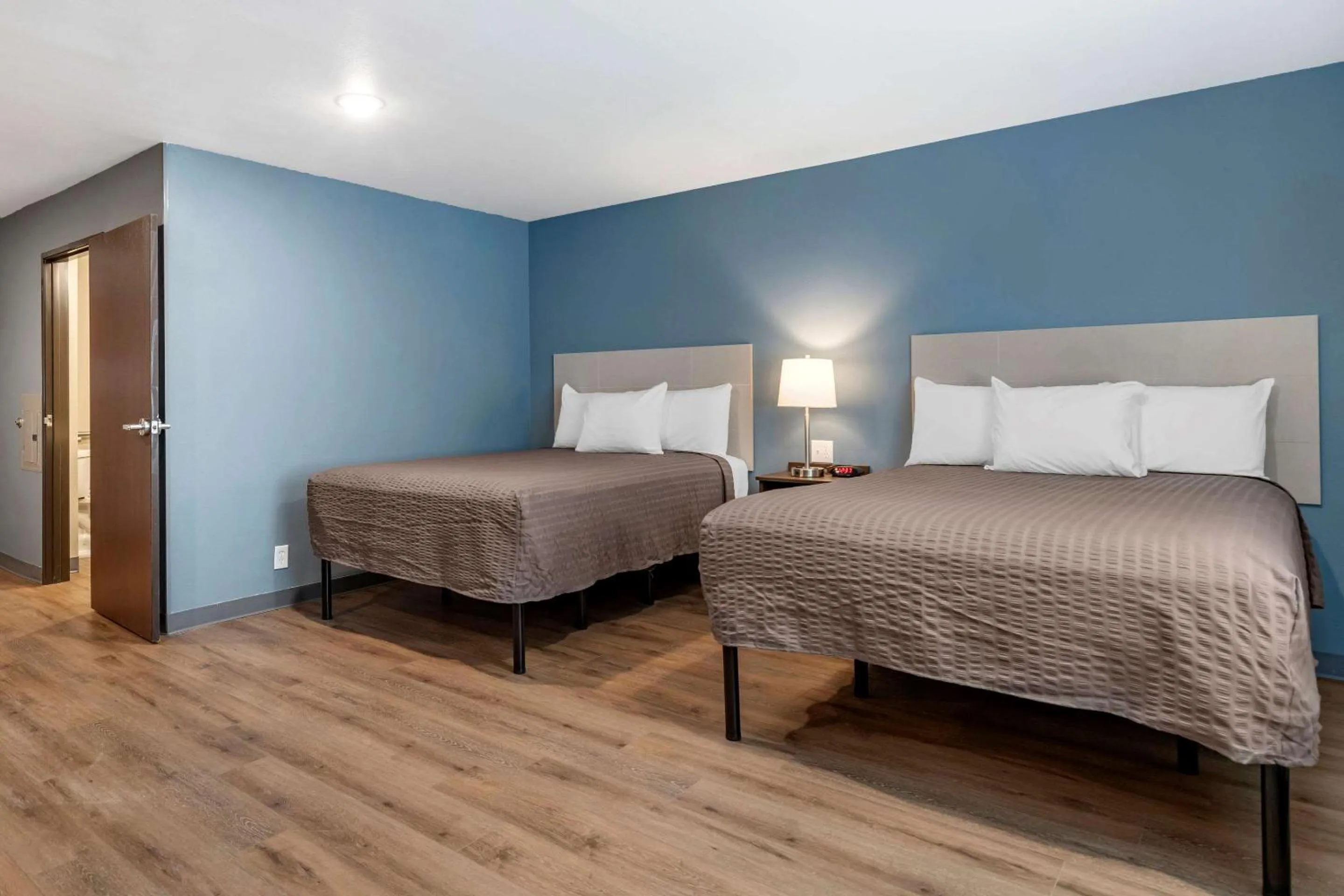 Photo of the whole room, Bed in WoodSpring Suites Austin Georgetown