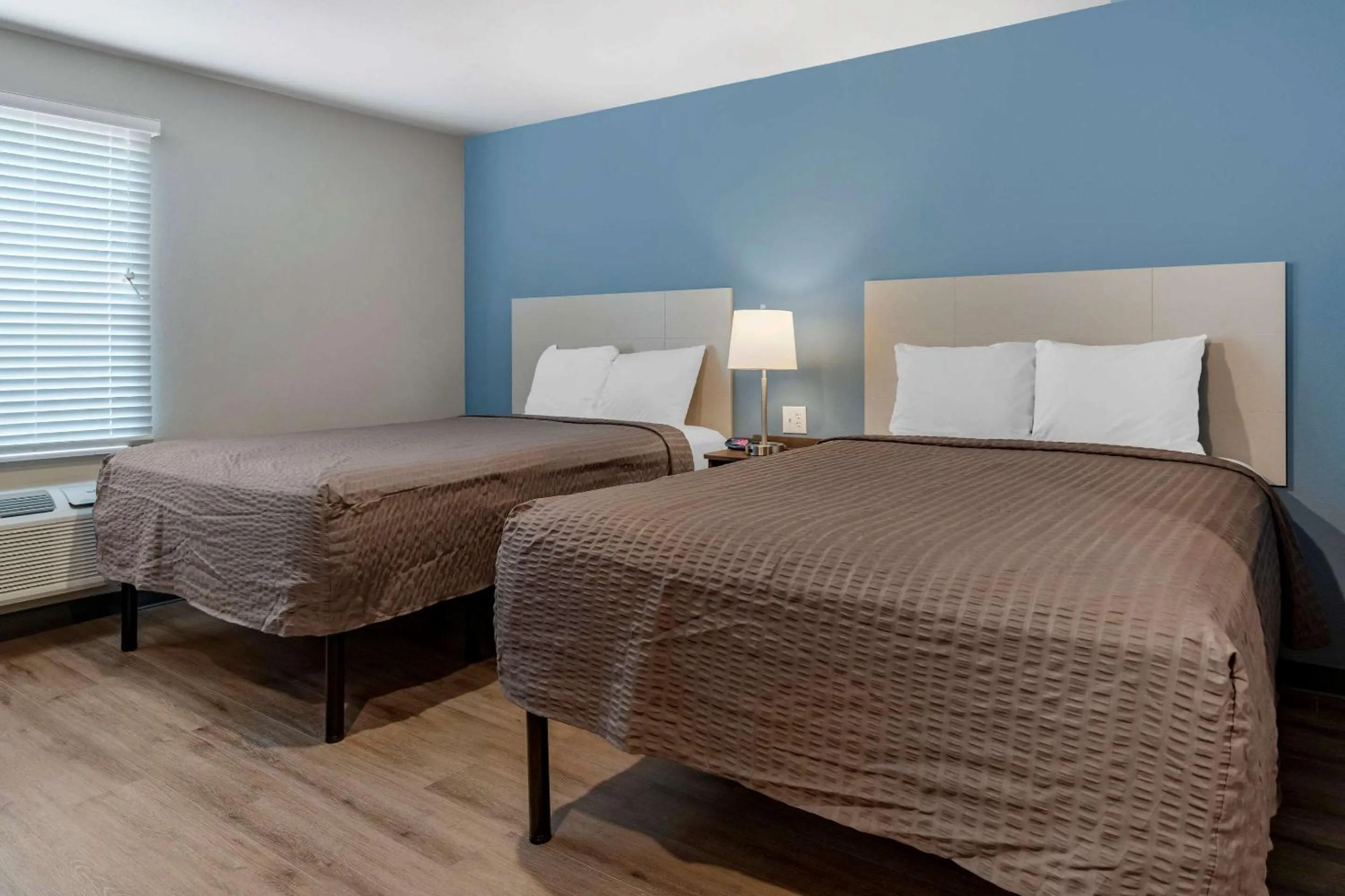 Photo of the whole room, Bed in WoodSpring Suites Austin Georgetown