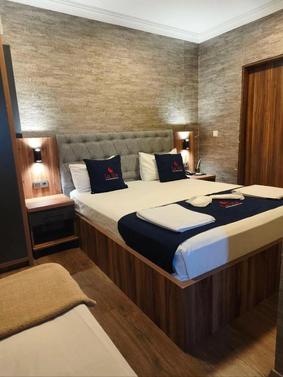 Bed in La Vie Suite Hotel