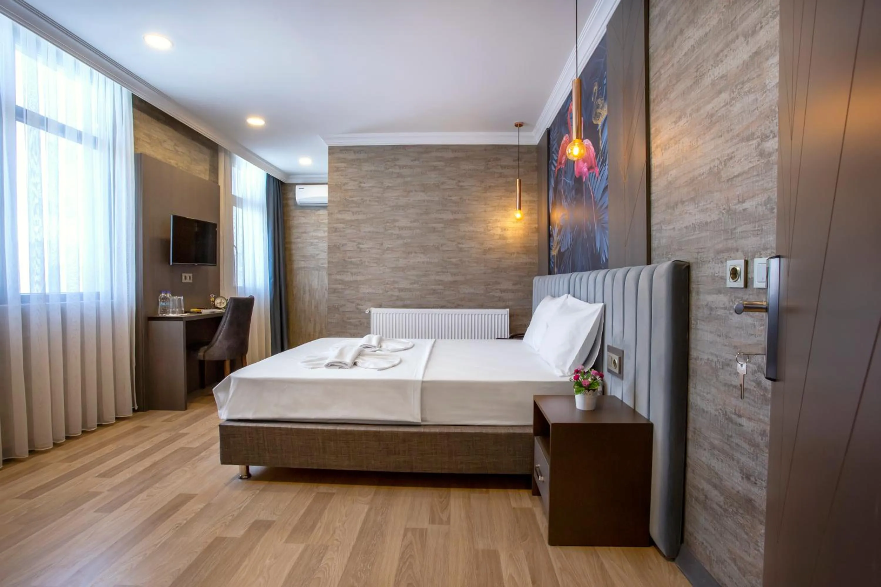Bed in La Vie Suite Hotel