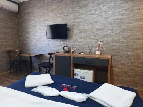 Bed in La Vie Suite Hotel