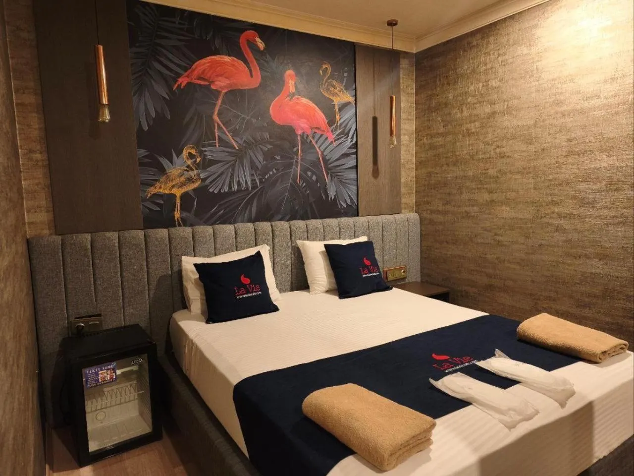 Bed in La Vie Suite Hotel