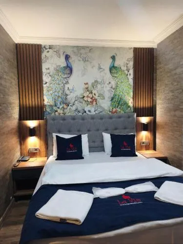 Bed in La Vie Suite Hotel