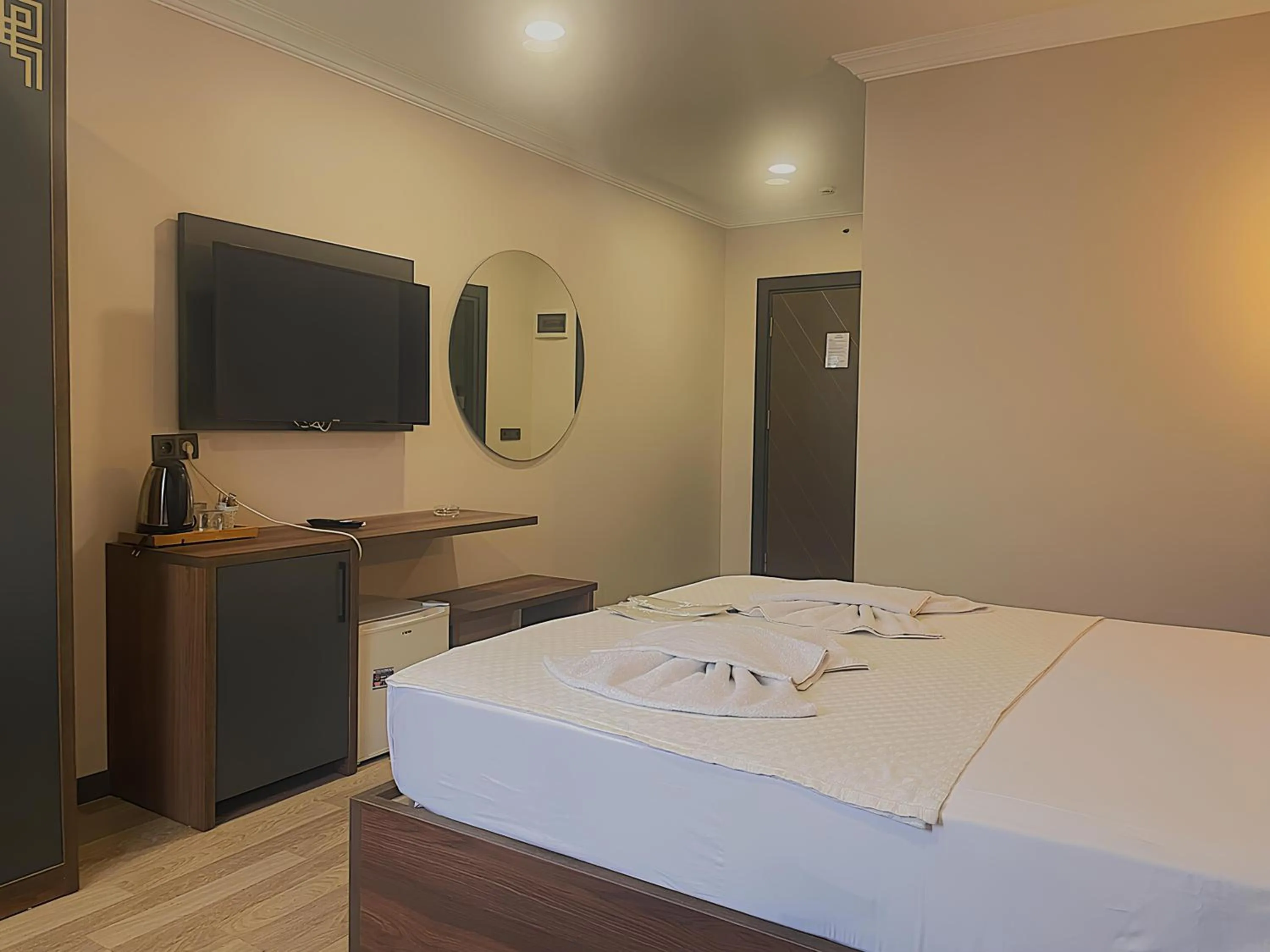 Bed in La Vie Suite Hotel