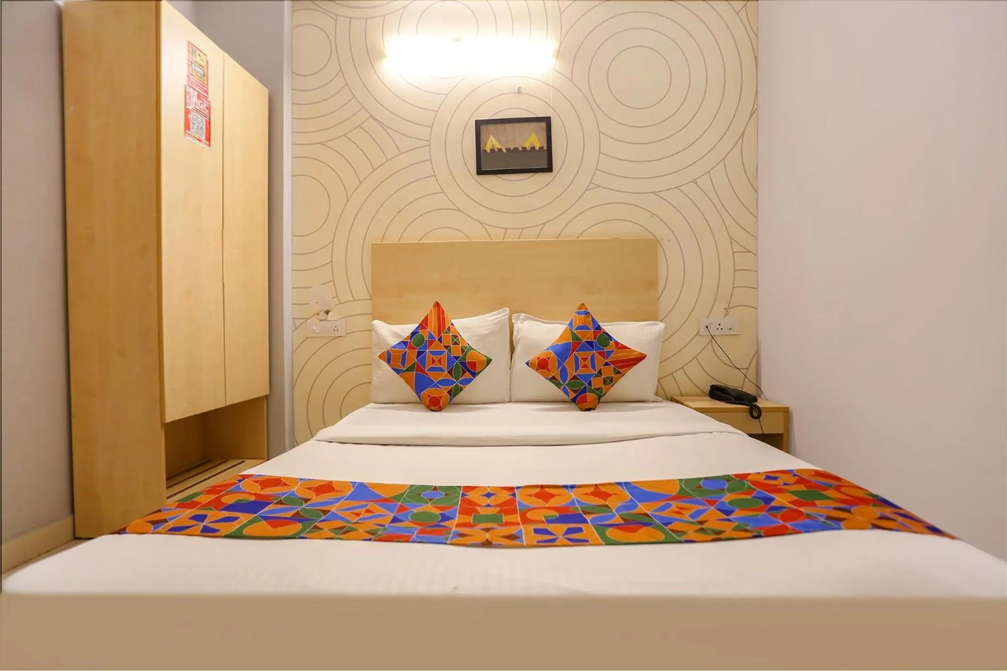 Bed in FabHotel Grand Capitol