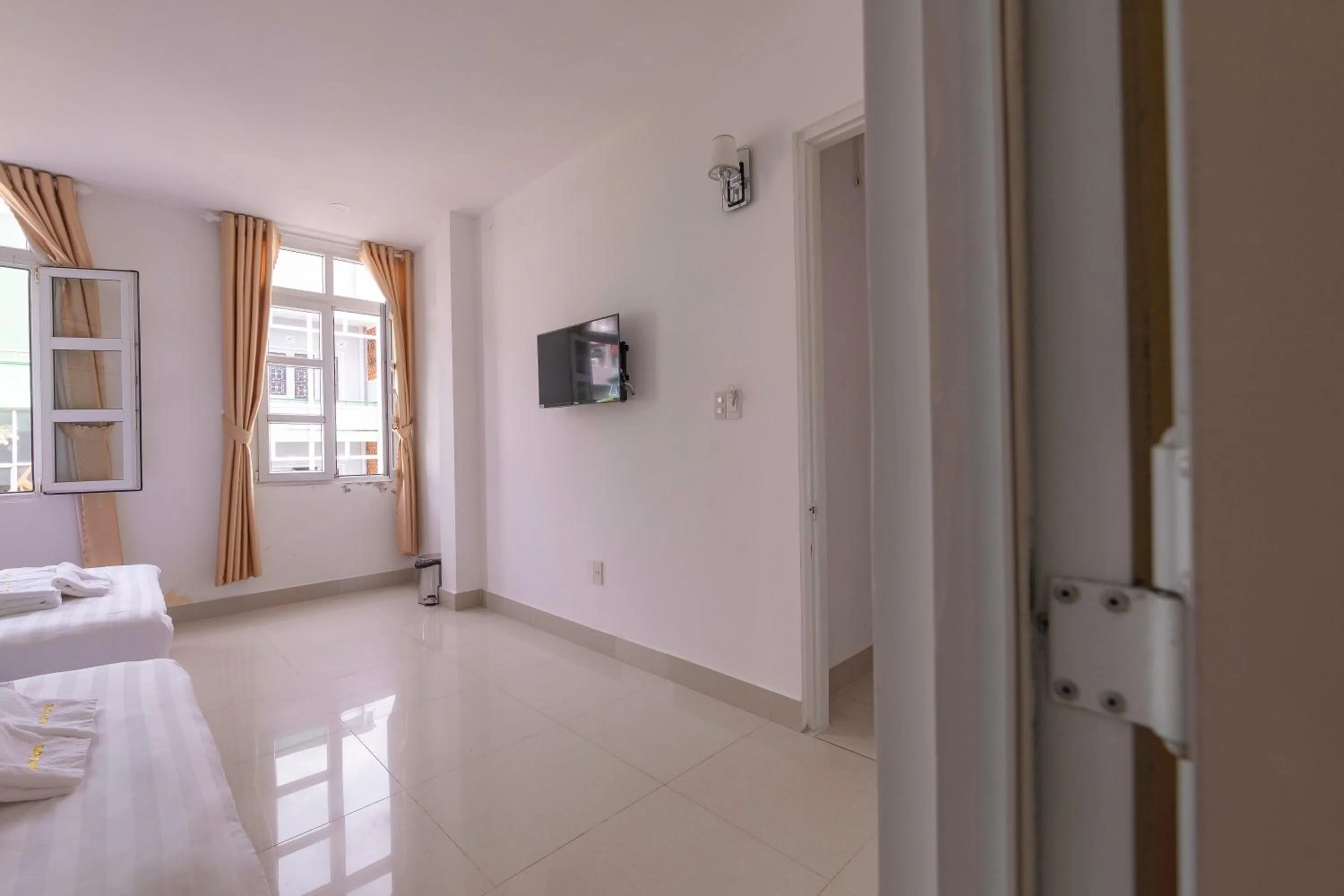 Bed in Dalat Joy Hotel