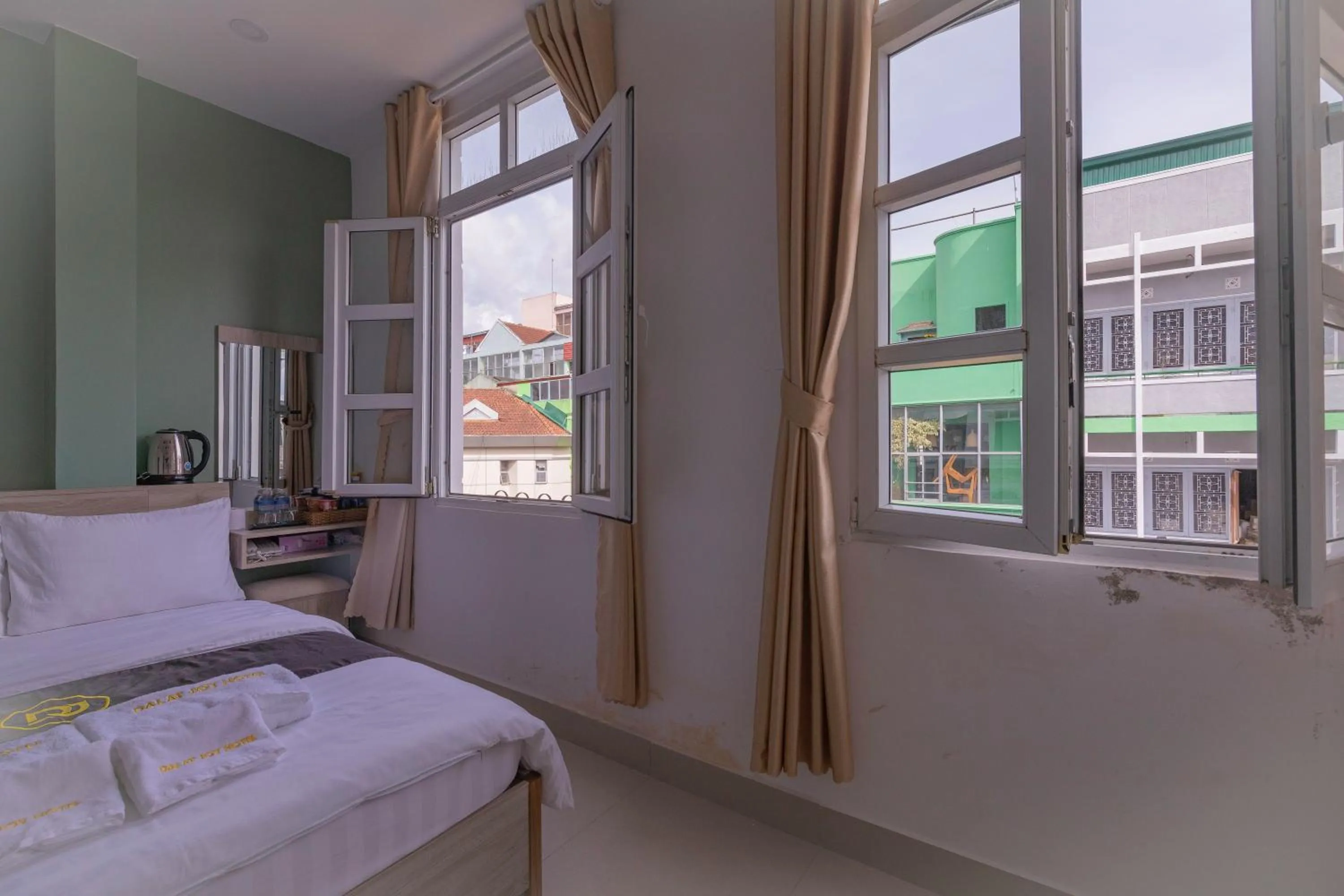 Bed in Dalat Joy Hotel