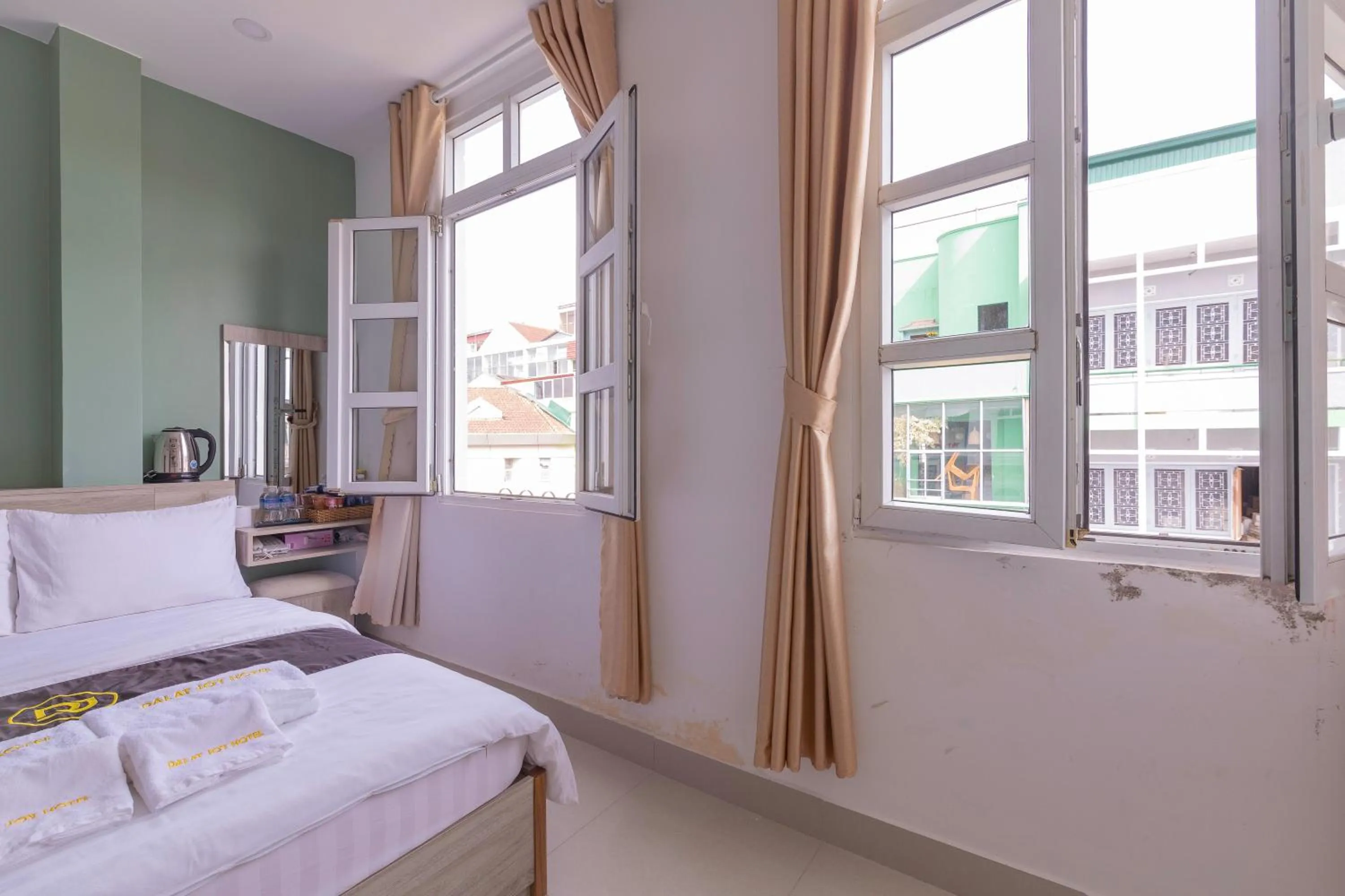 Bed in Dalat Joy Hotel