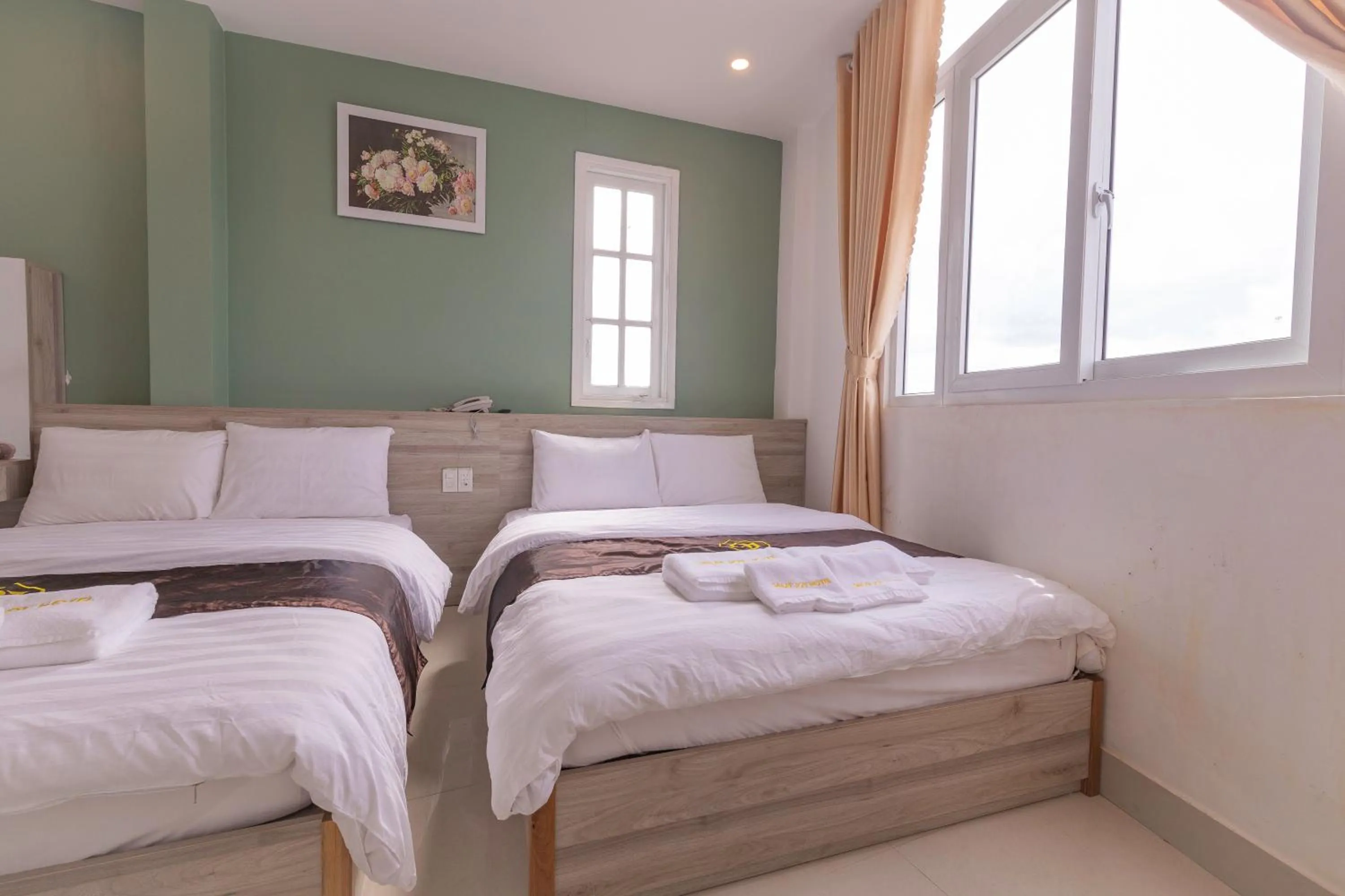 Bed in Dalat Joy Hotel