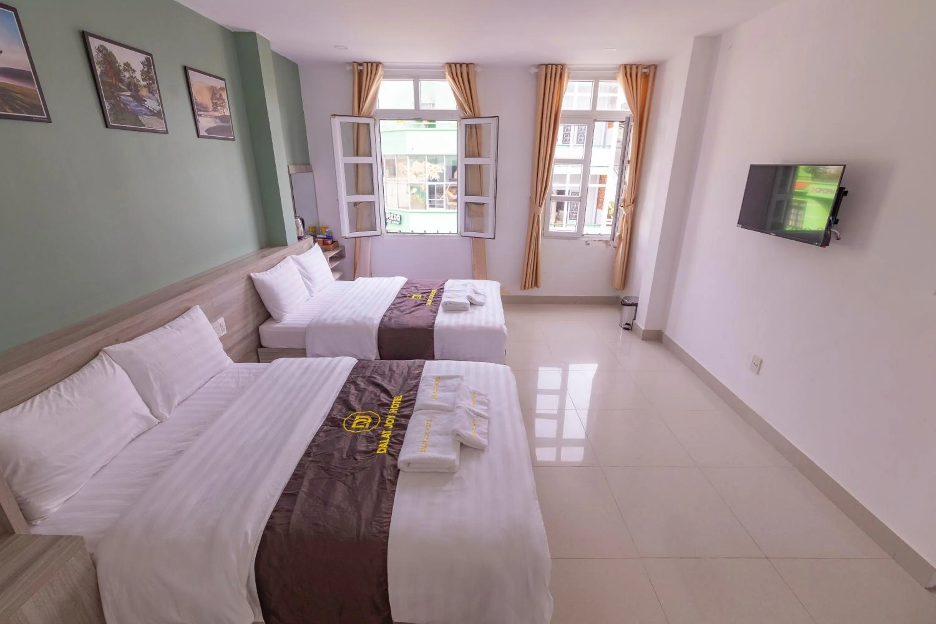 Bed in Dalat Joy Hotel