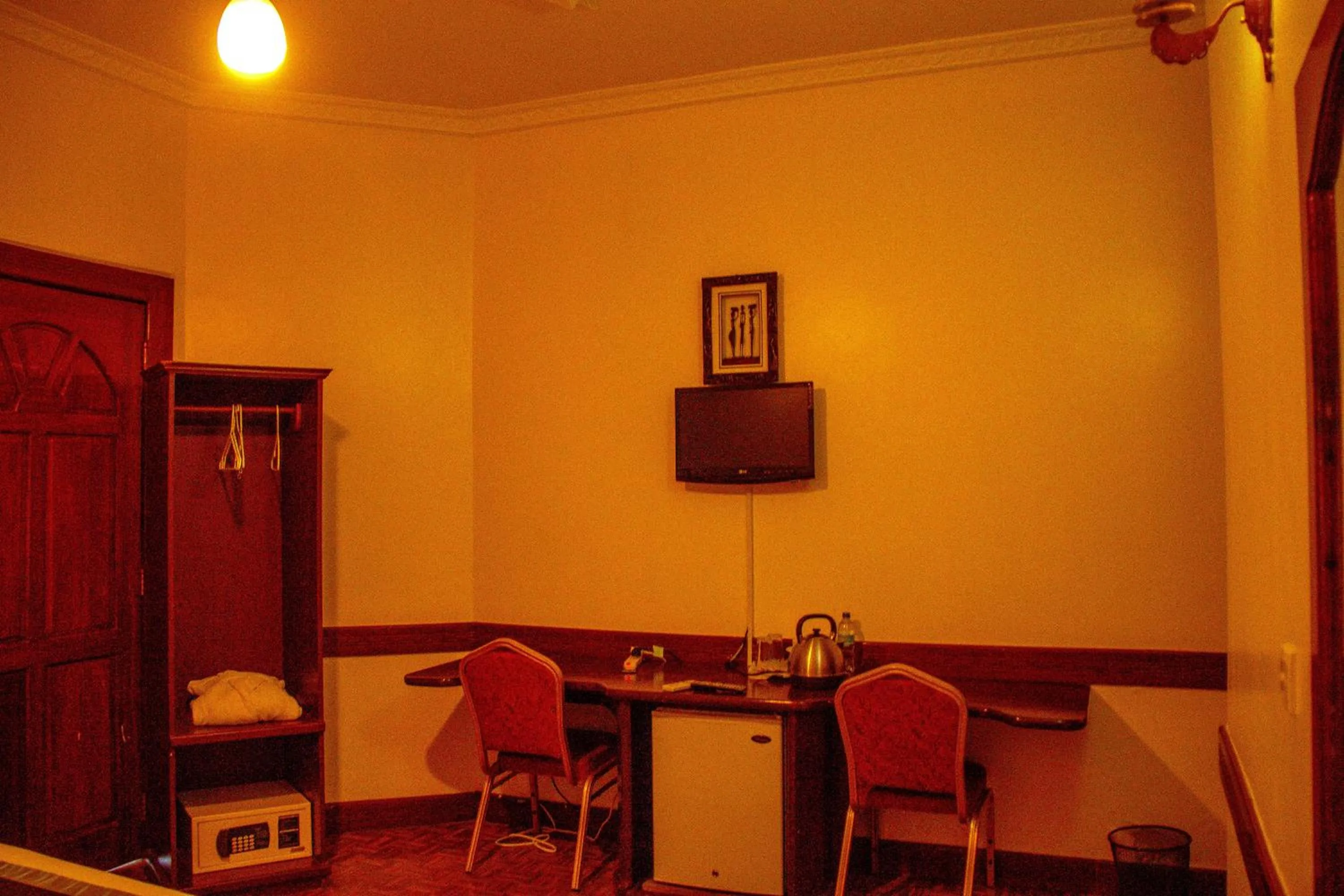 Seating area in New Charity Hotel International