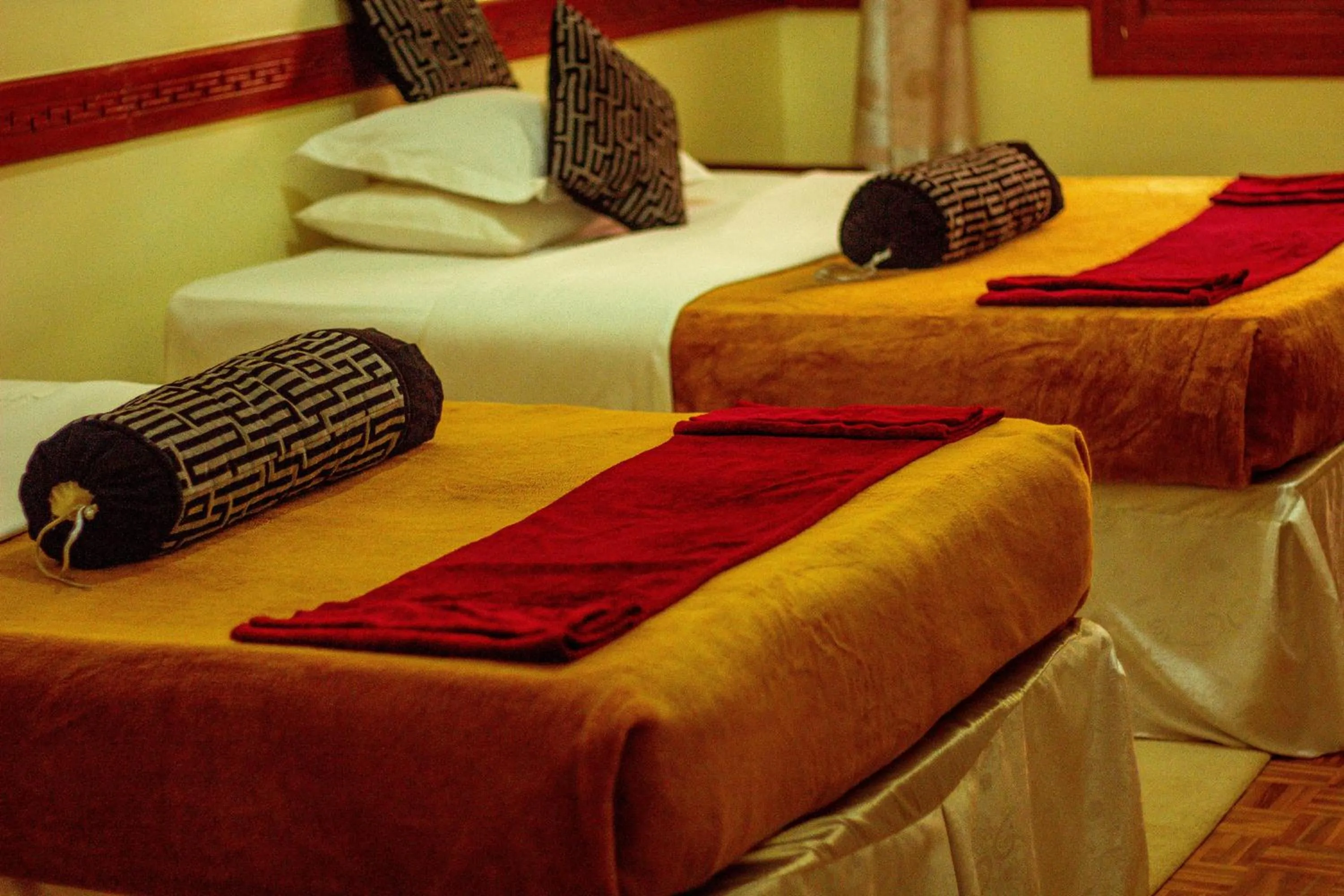 Bed in New Charity Hotel International