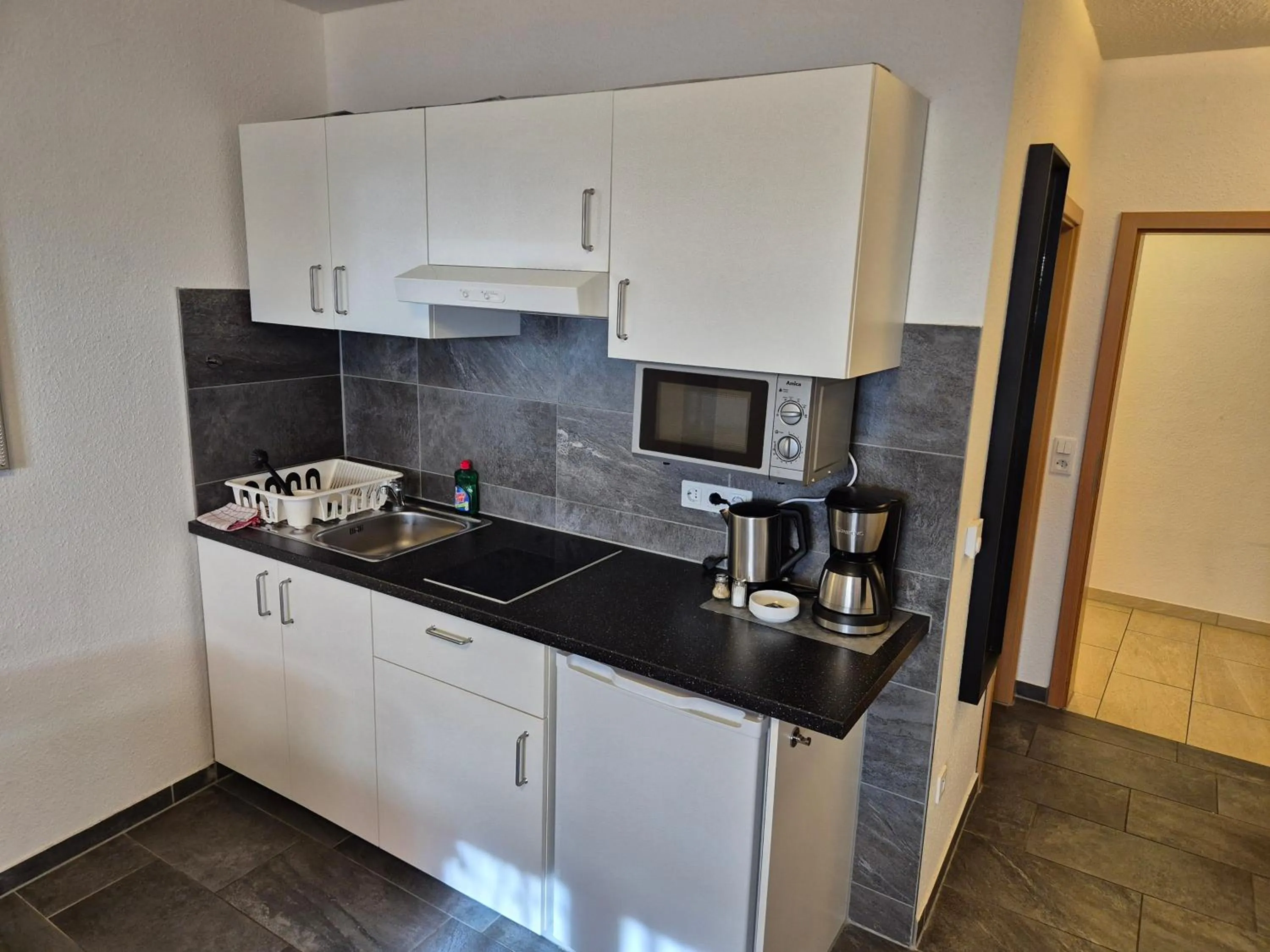 Kitchen or kitchenette in Hotel Am Kamin