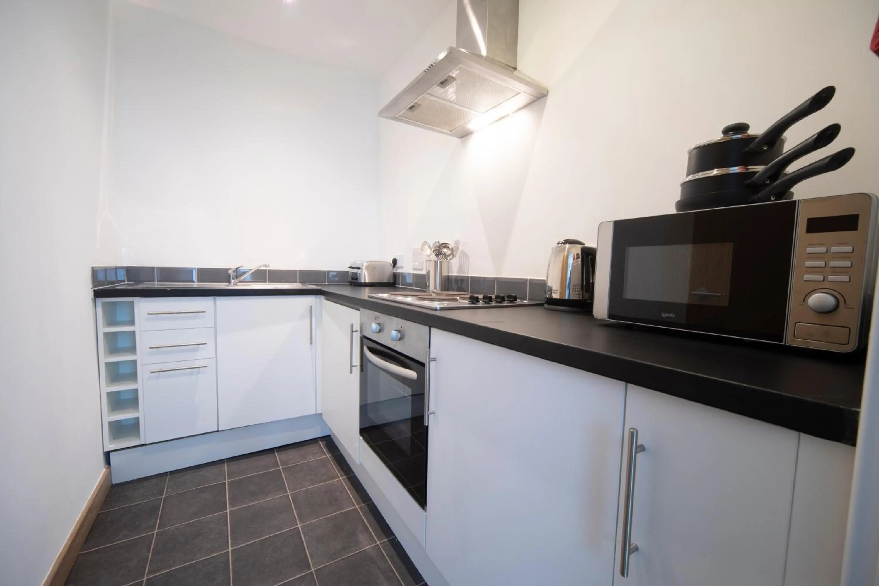 Kitchen or kitchenette in Wellington Apartments