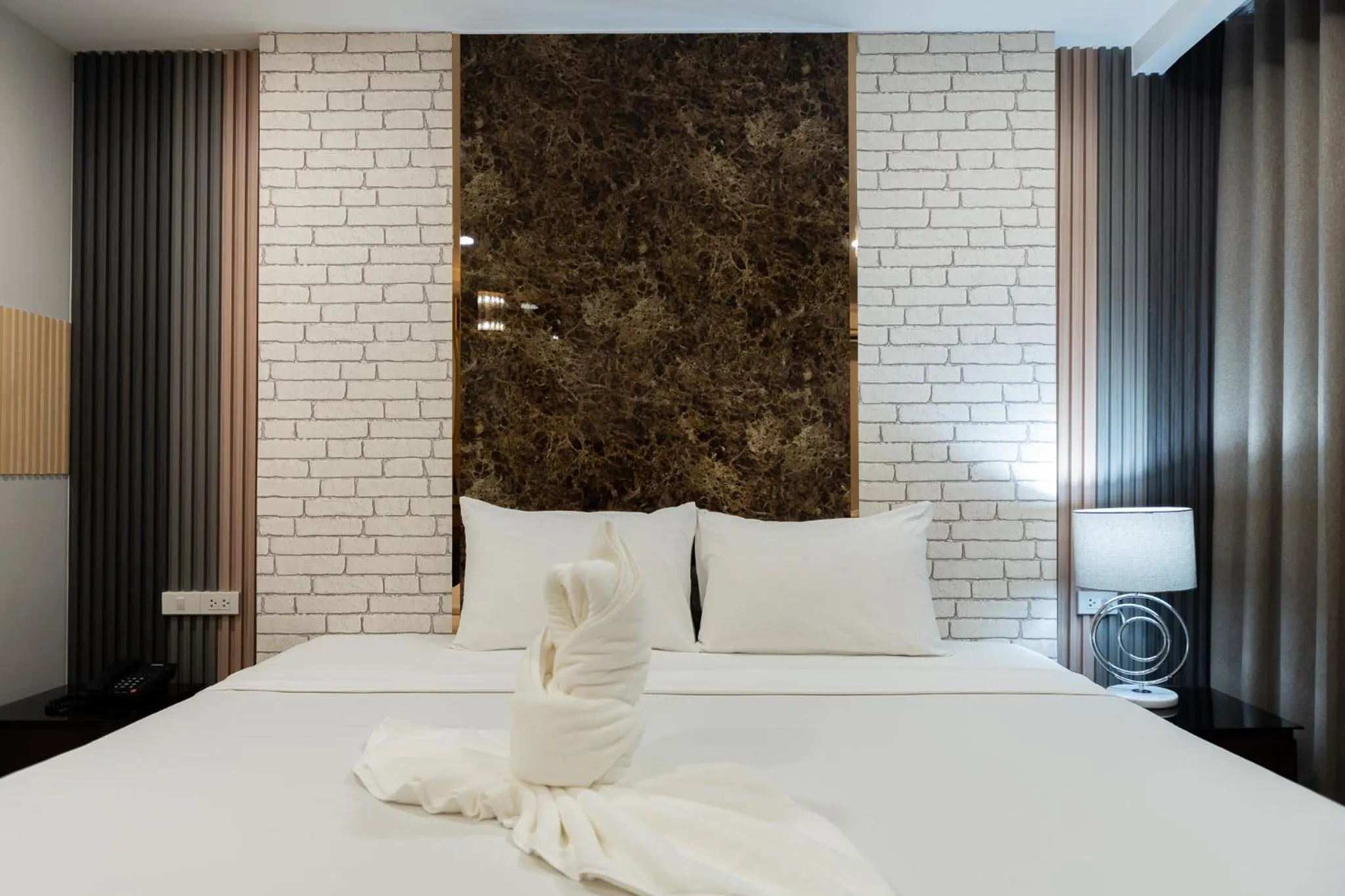 Bed in Hotel Pattaya Beach