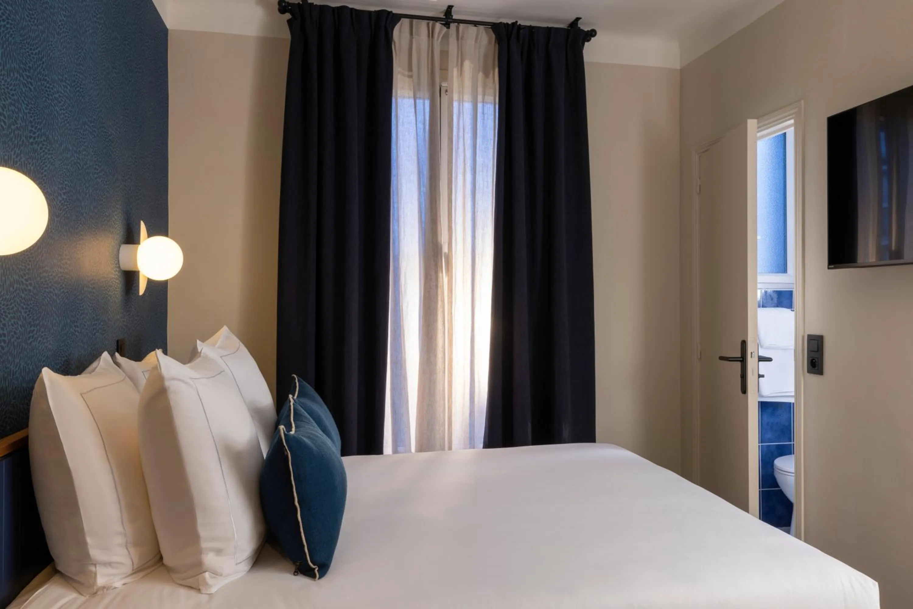 Bed in Bijou Hôtel Paris Boulogne