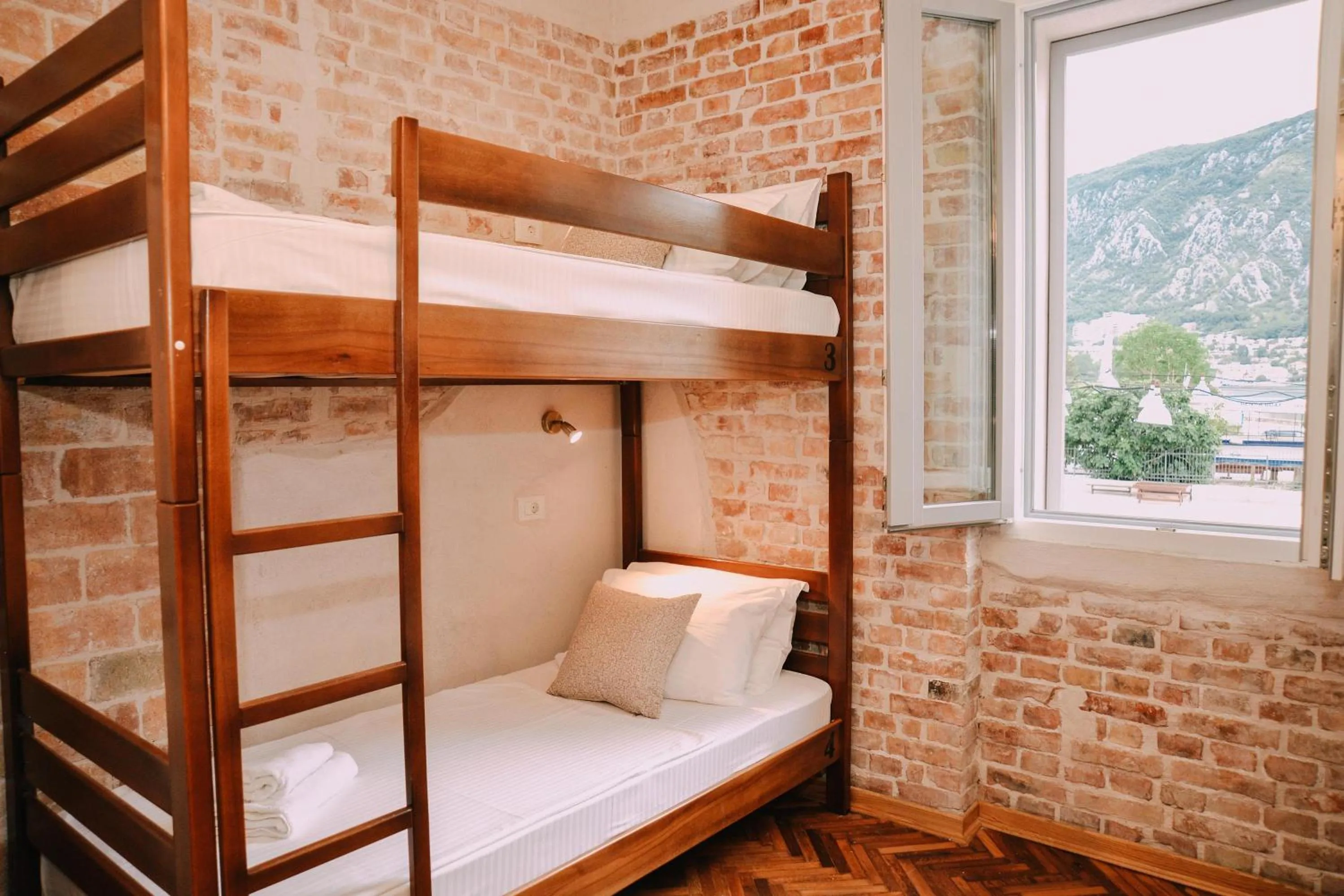 Bed in Step to Kotor bay Guesthouse