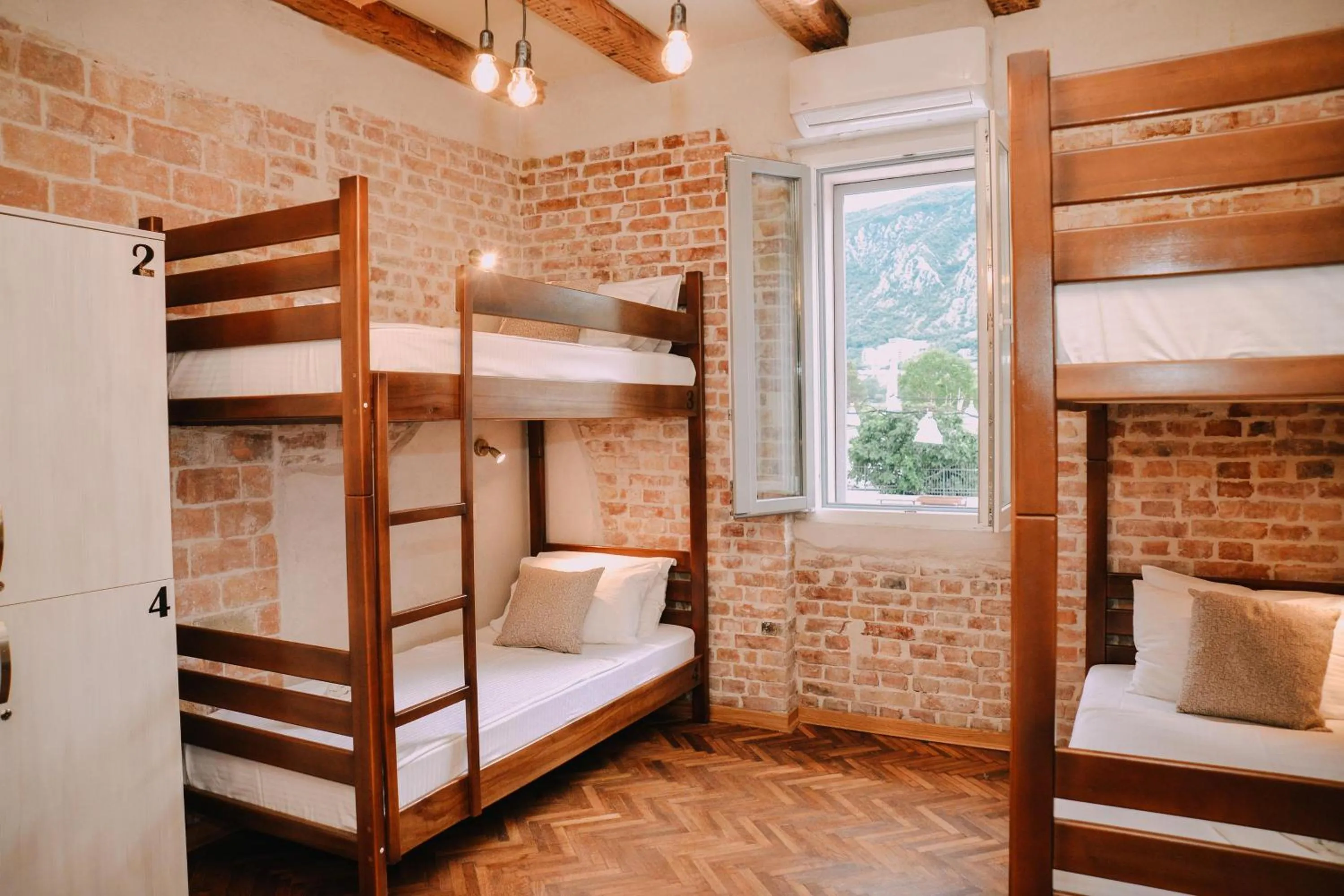 Bed in Step to Kotor bay Guesthouse