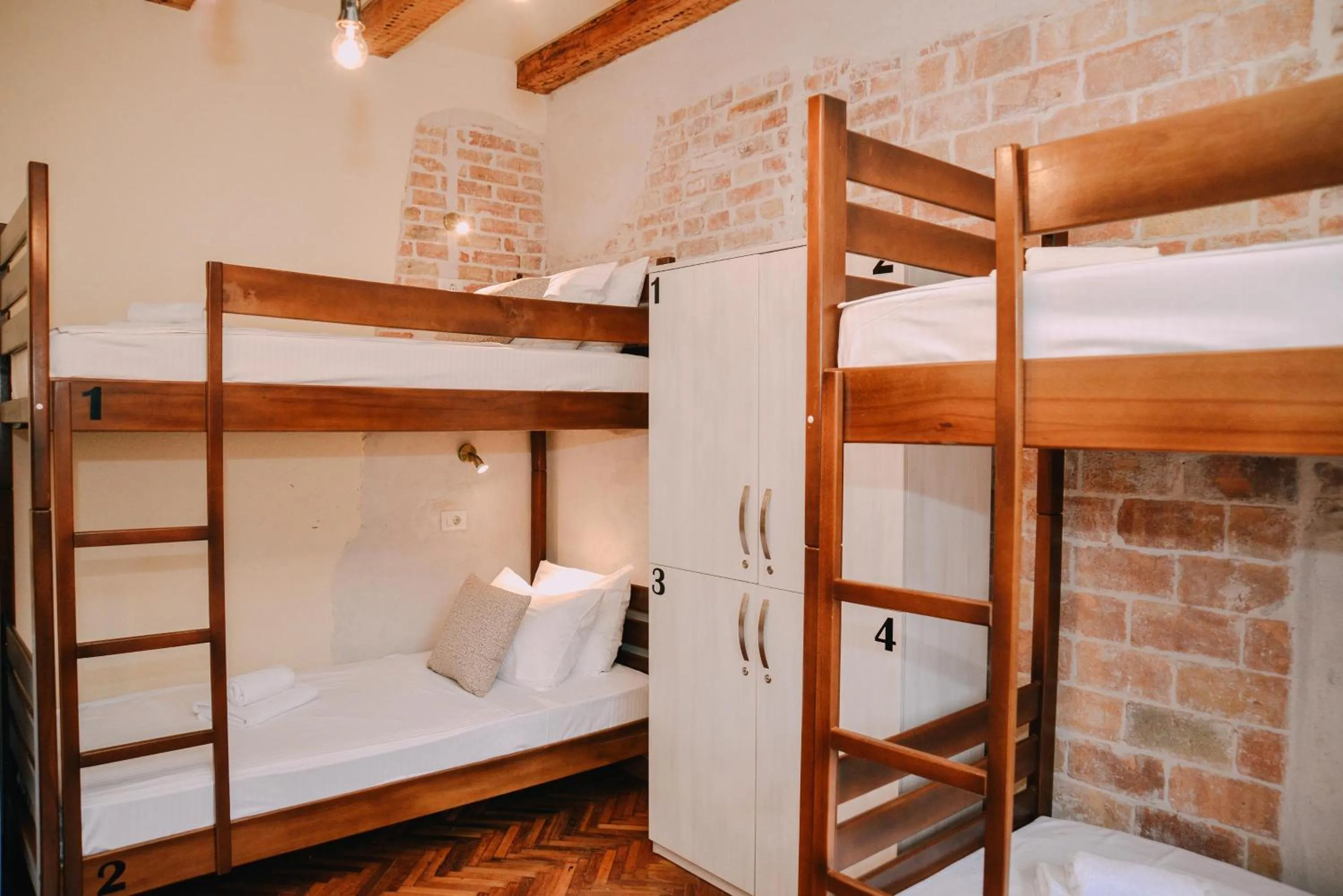 Bed in Step to Kotor bay Guesthouse