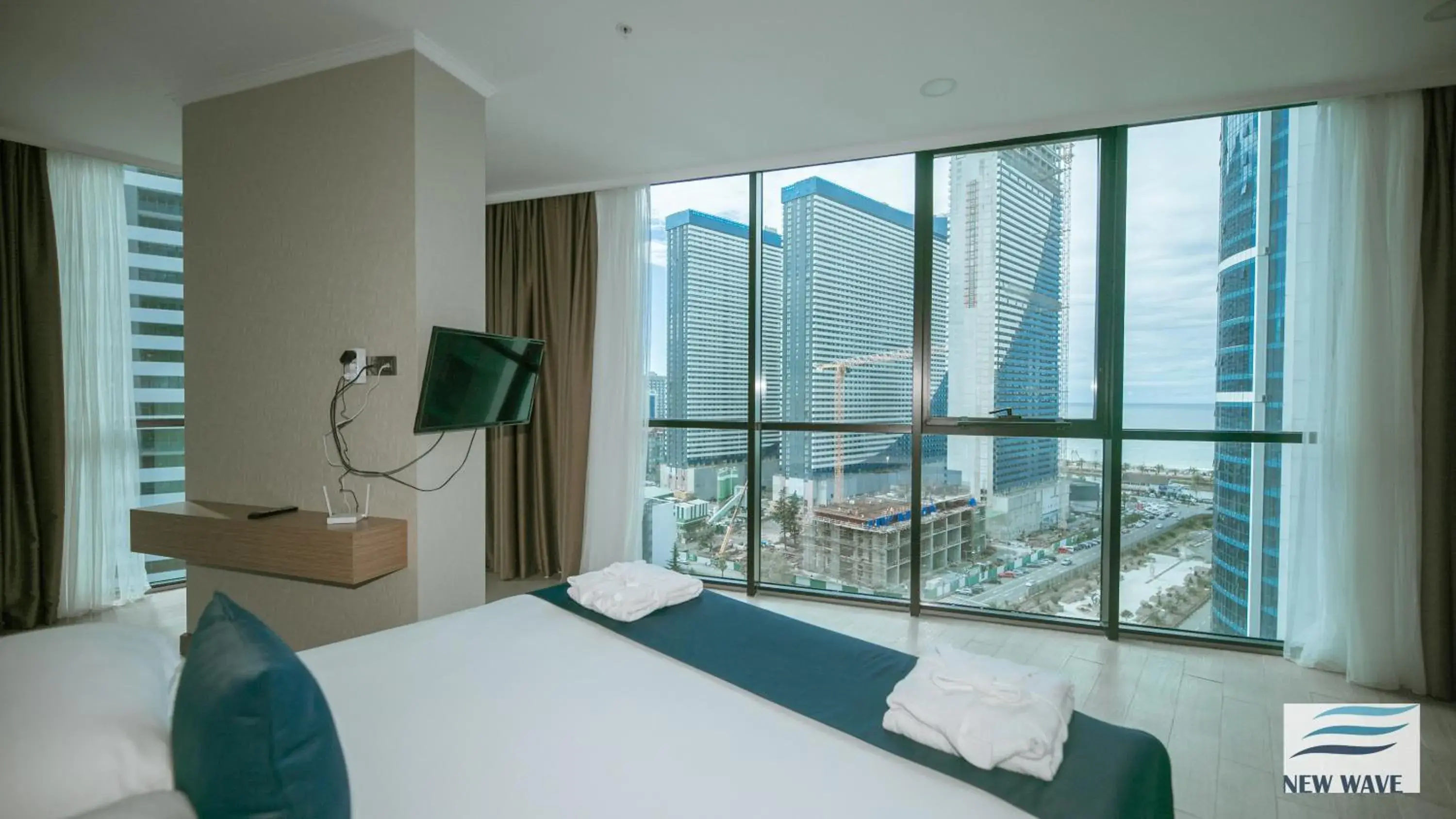 Photo of the whole room, Bed in New Wave Hotel Photo of the whole room, Bed in New Wave Hotel