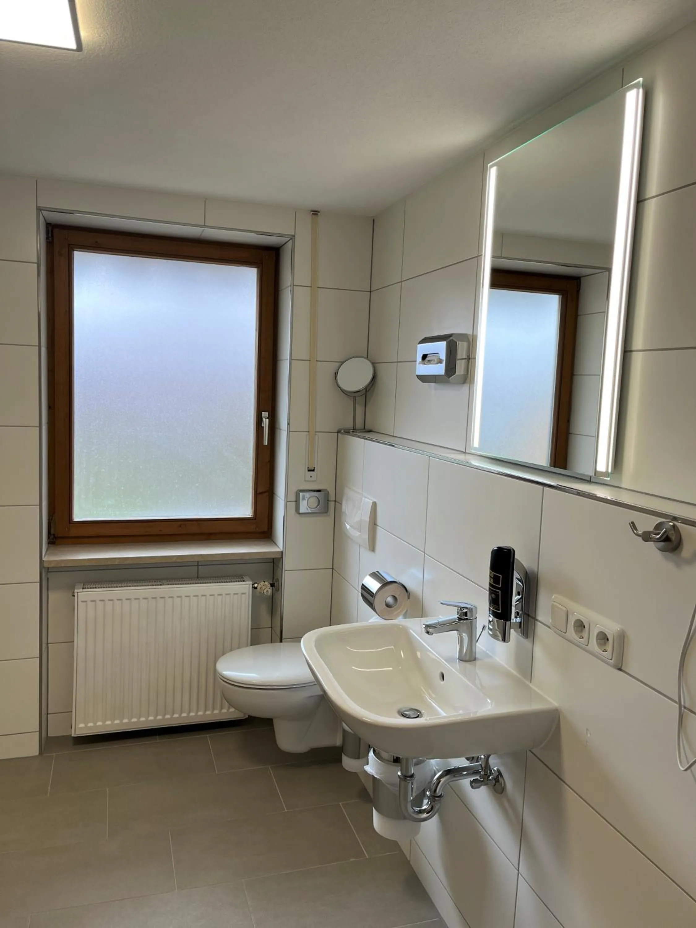 Bathroom in Gästehaus Forggensee