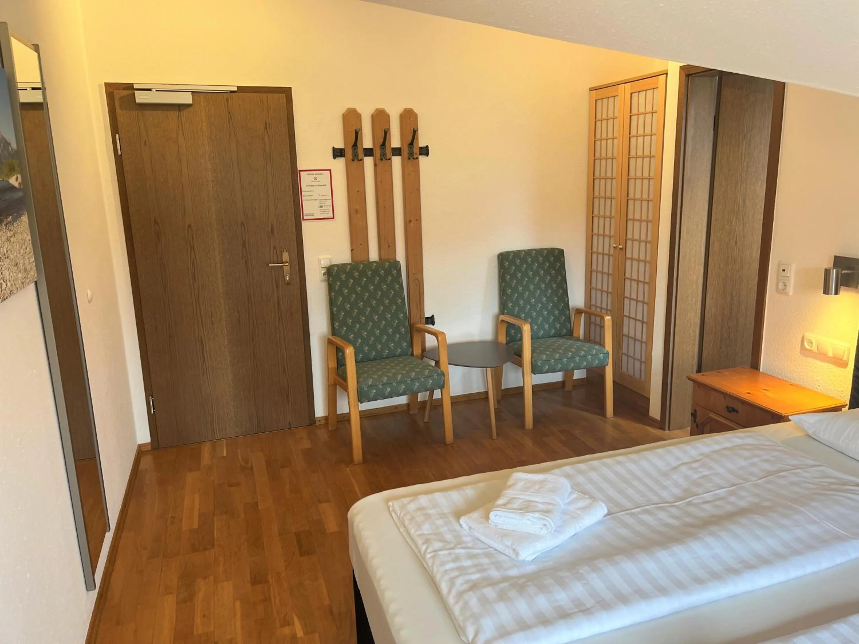 Photo of the whole room, Bed in Gästehaus Forggensee