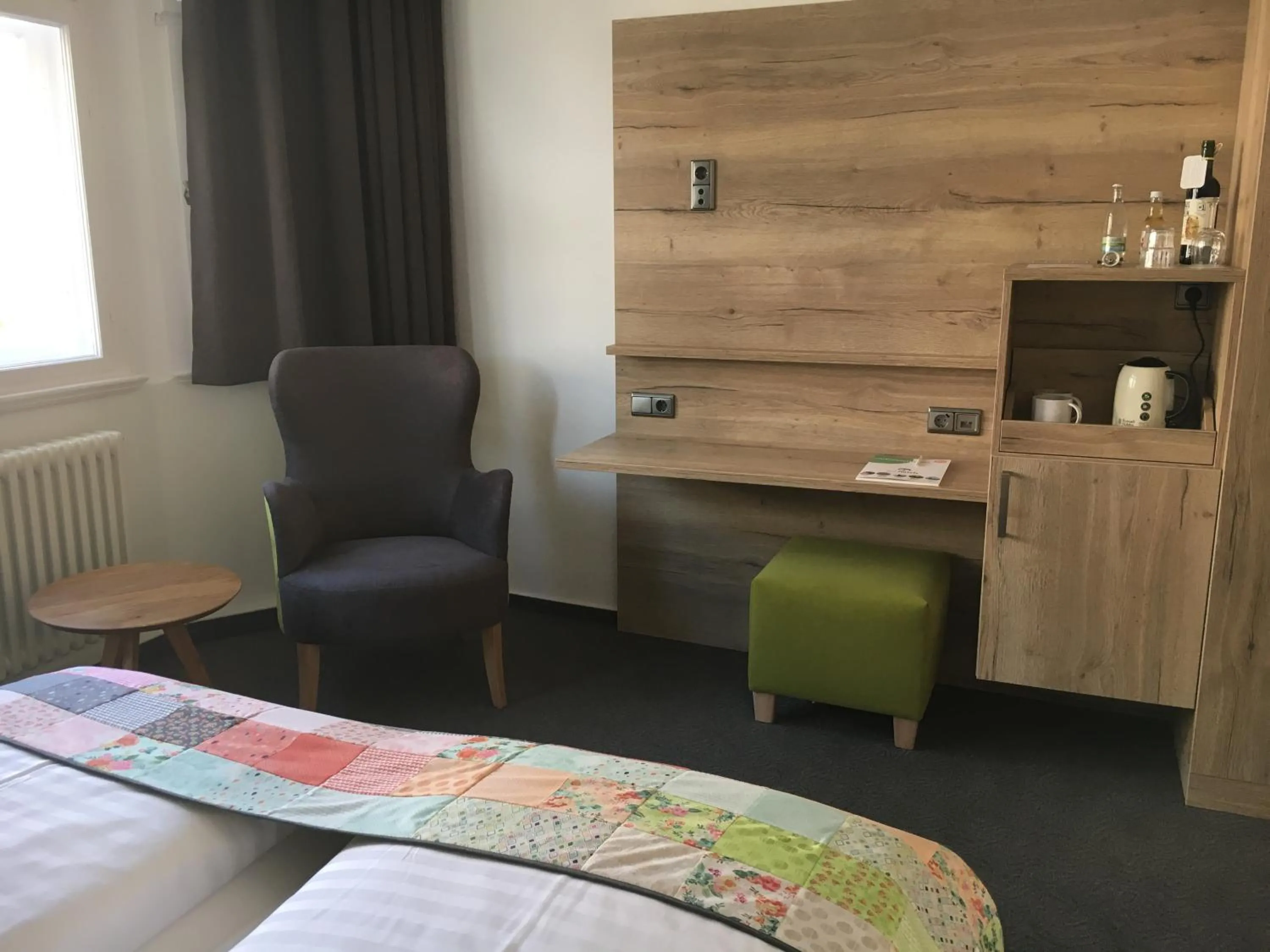 Seating area, Bed in Stadt-Gut-Hotels - Das Kleine Hotel