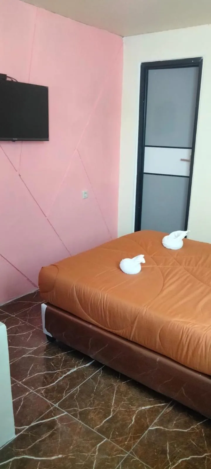 Bed in Votel Hotel De'Pratnya Kediri