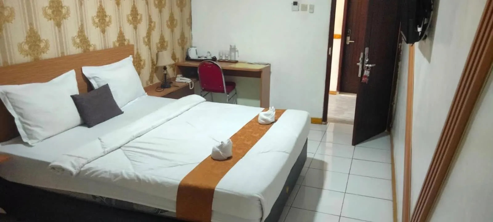 Bed in Votel Hotel De'Pratnya Kediri