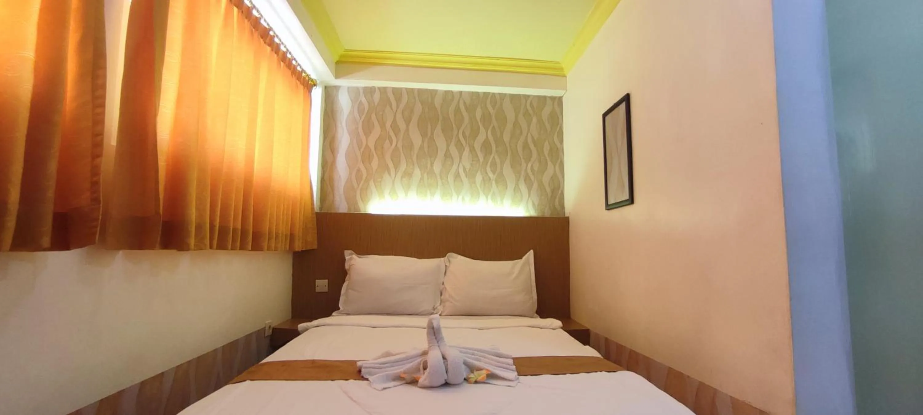 Bed in Votel Hotel De'Pratnya Kediri