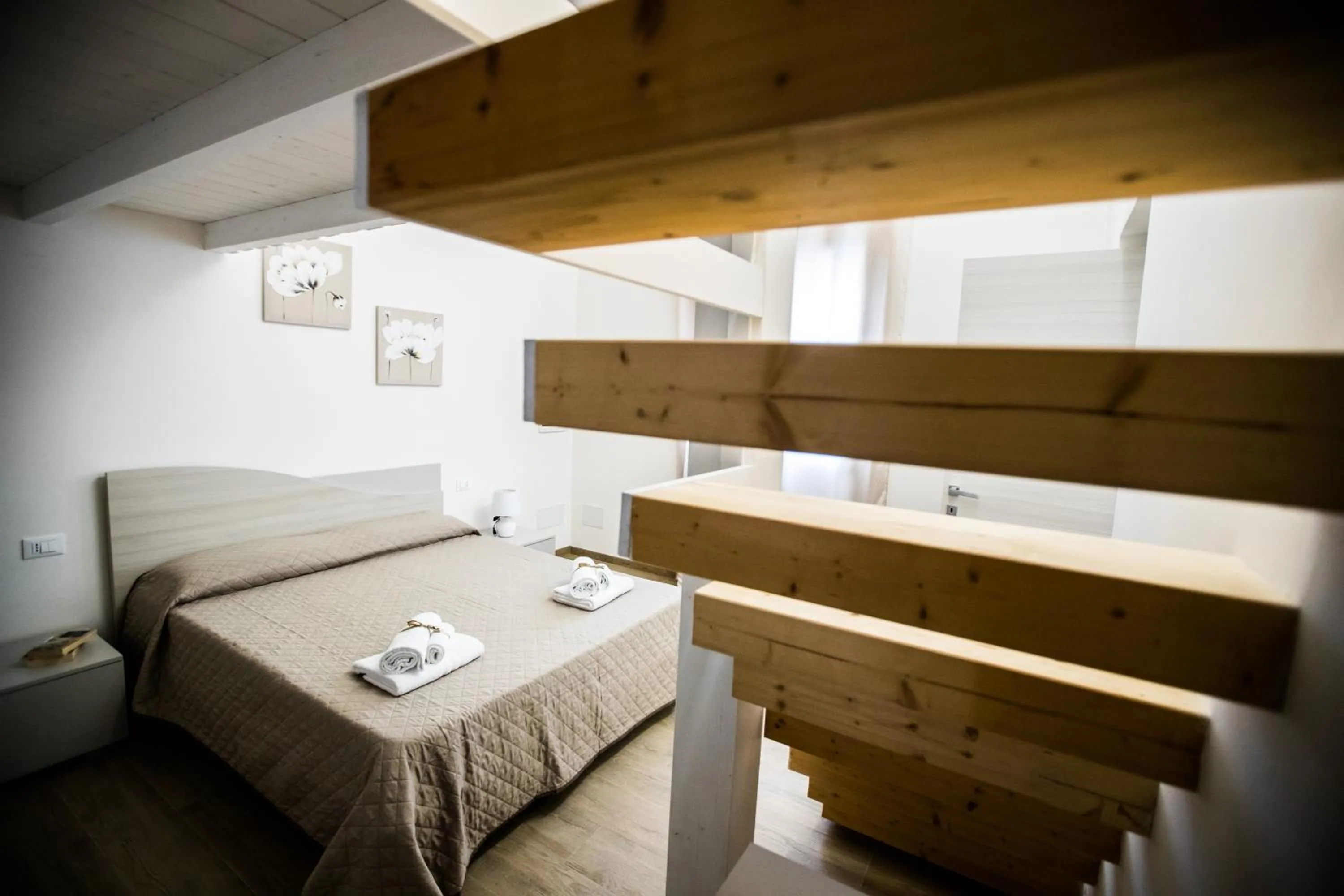 Bed in Case Vacanza Le Maioliche