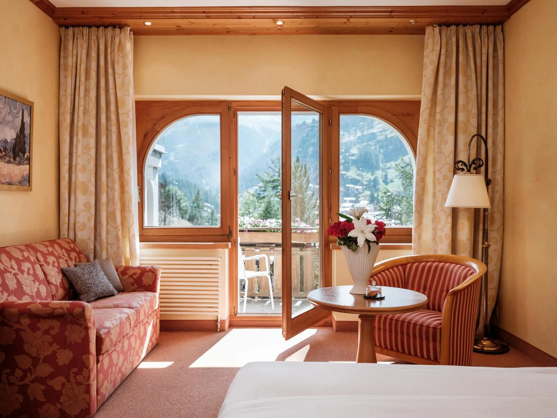 Photo of the whole room, Bed in Relais & Chateaux Schönegg