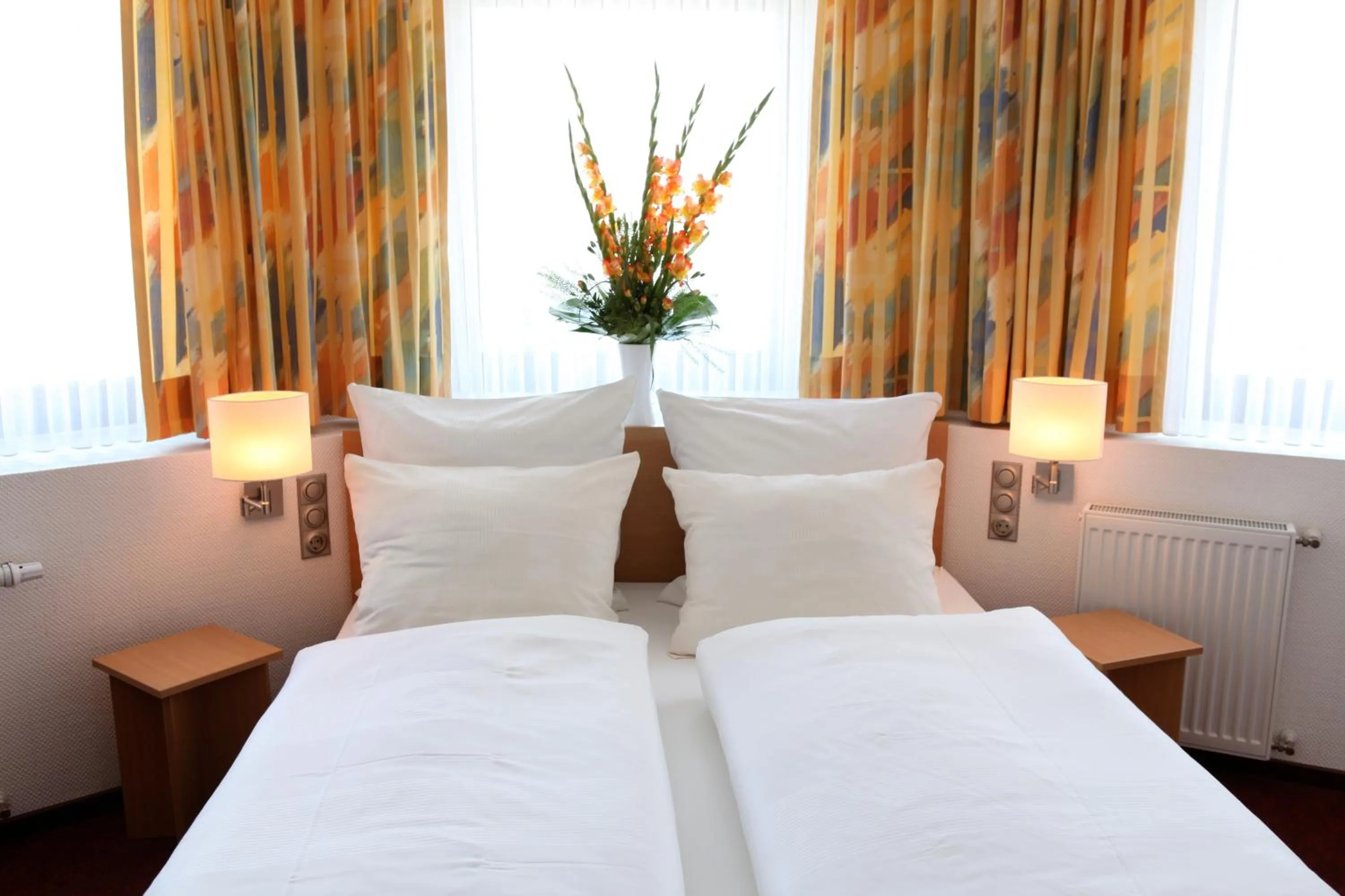 Photo of the whole room, Bed in Akzent Hotel Oberhausen