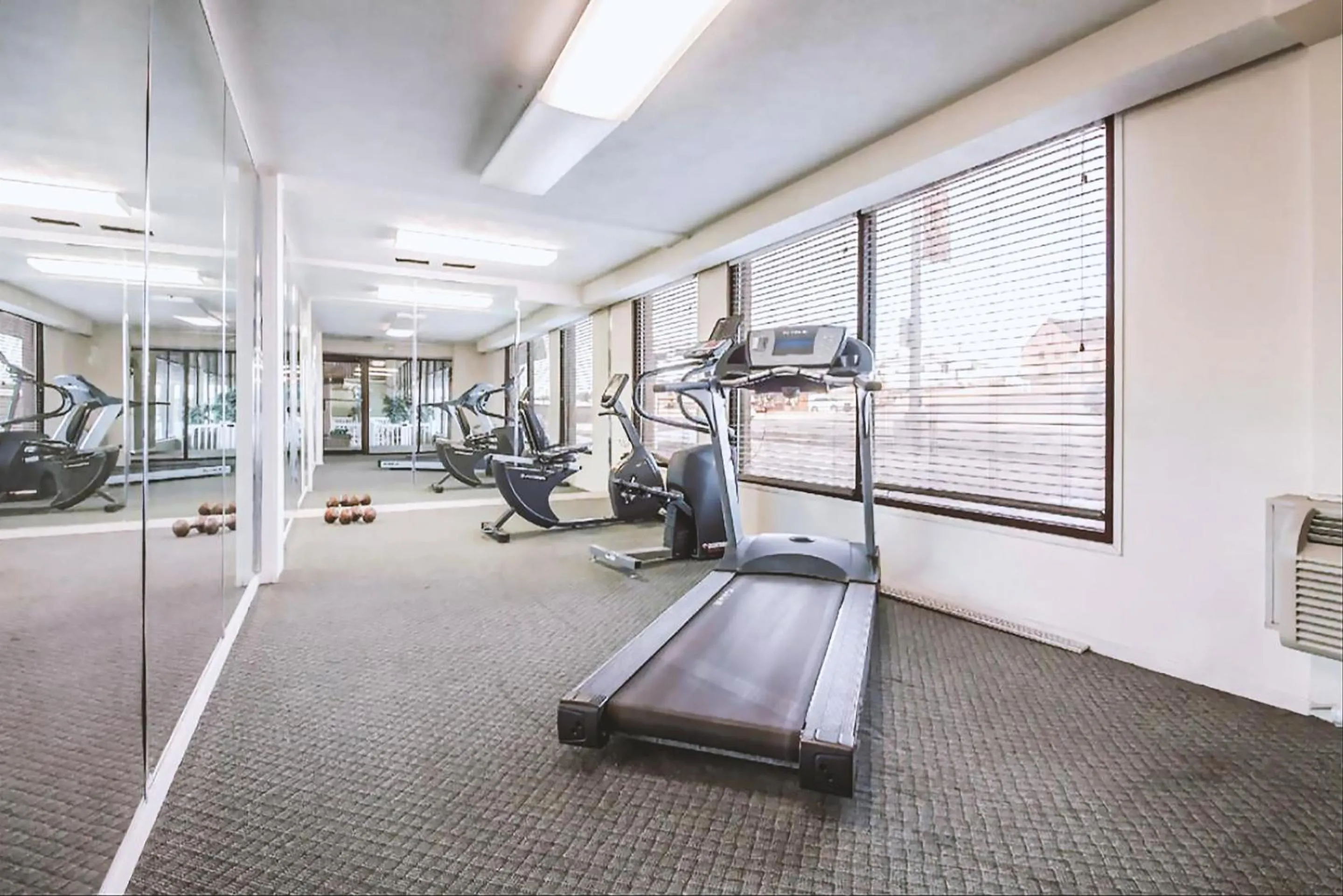 Fitness centre/facilities in Coratel Inn & Suites by Jasper McCook