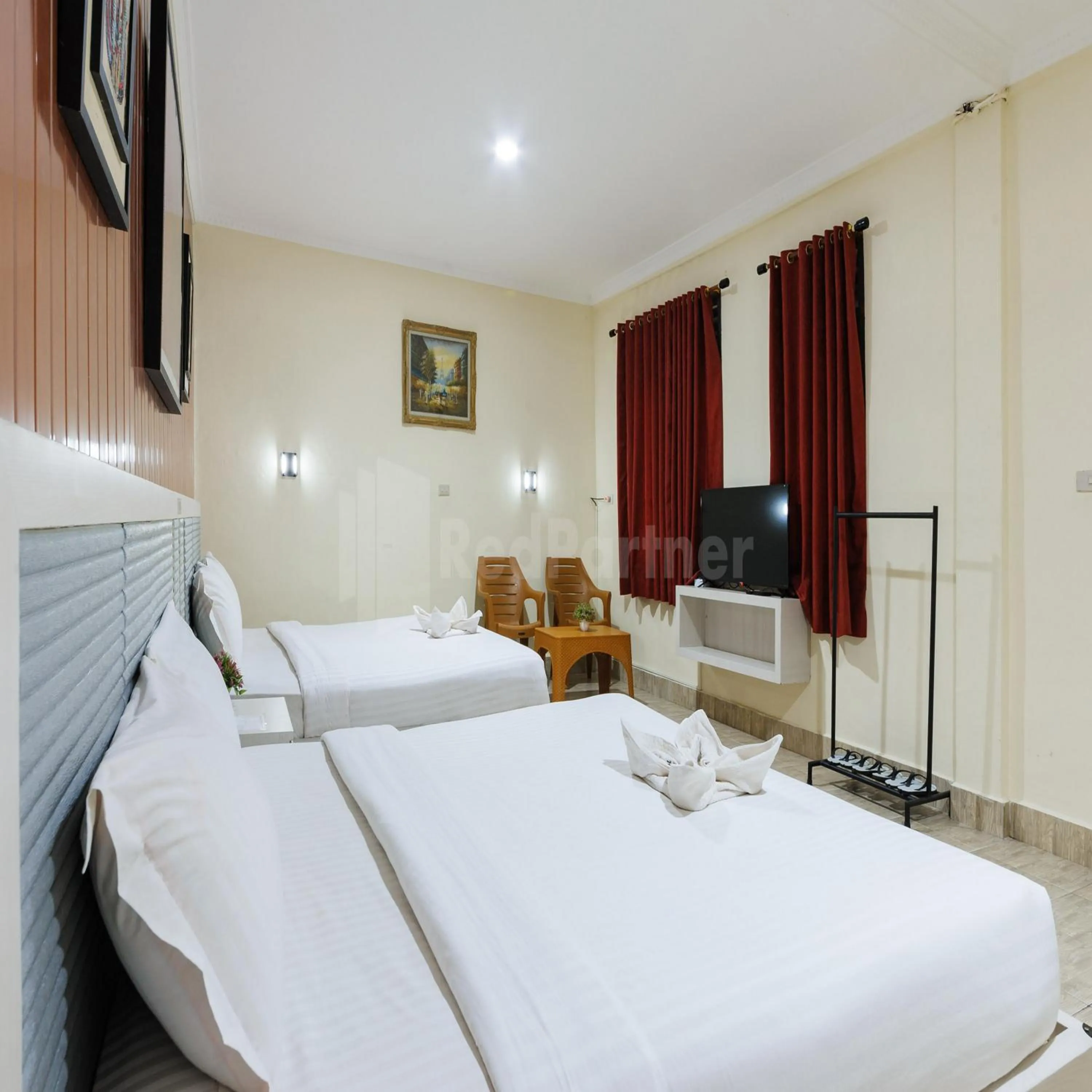 Bedroom, Bed in Hotel 78 Parapat Mitra RedDoorz