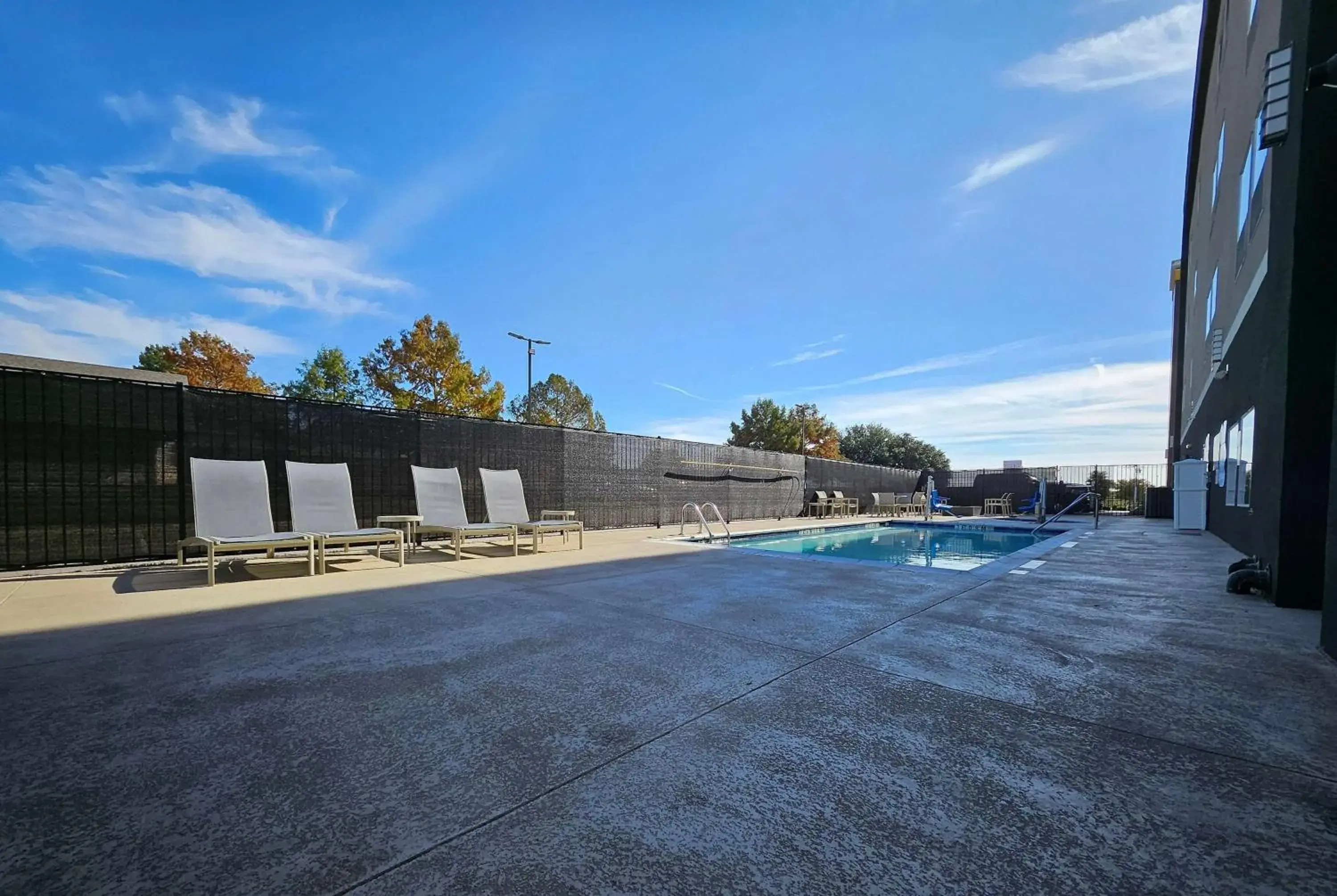 Pool view in La Quinta Inn & Suites by Wyndham - Red Oak TX IH-35E Pool view in La Quinta Inn & Suites by Wyndham - Red Oak TX IH-35E