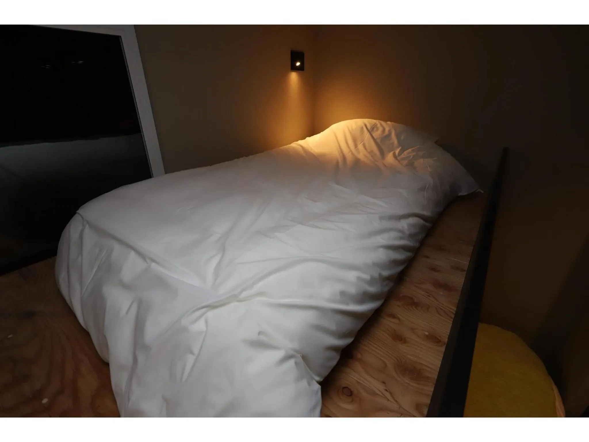 Bed in Uchi Living Stay AOZORA