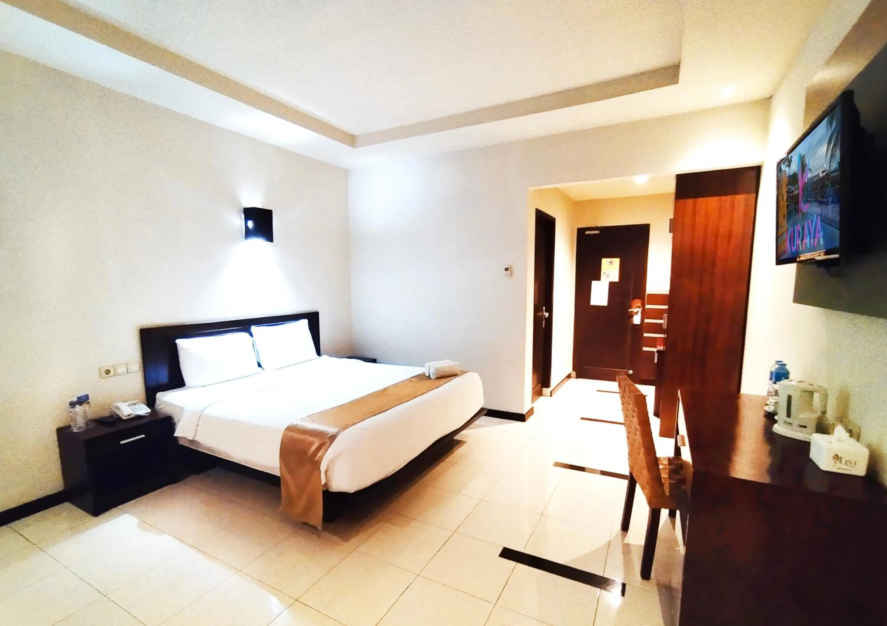 Bed in Kuraya Hotel Residence