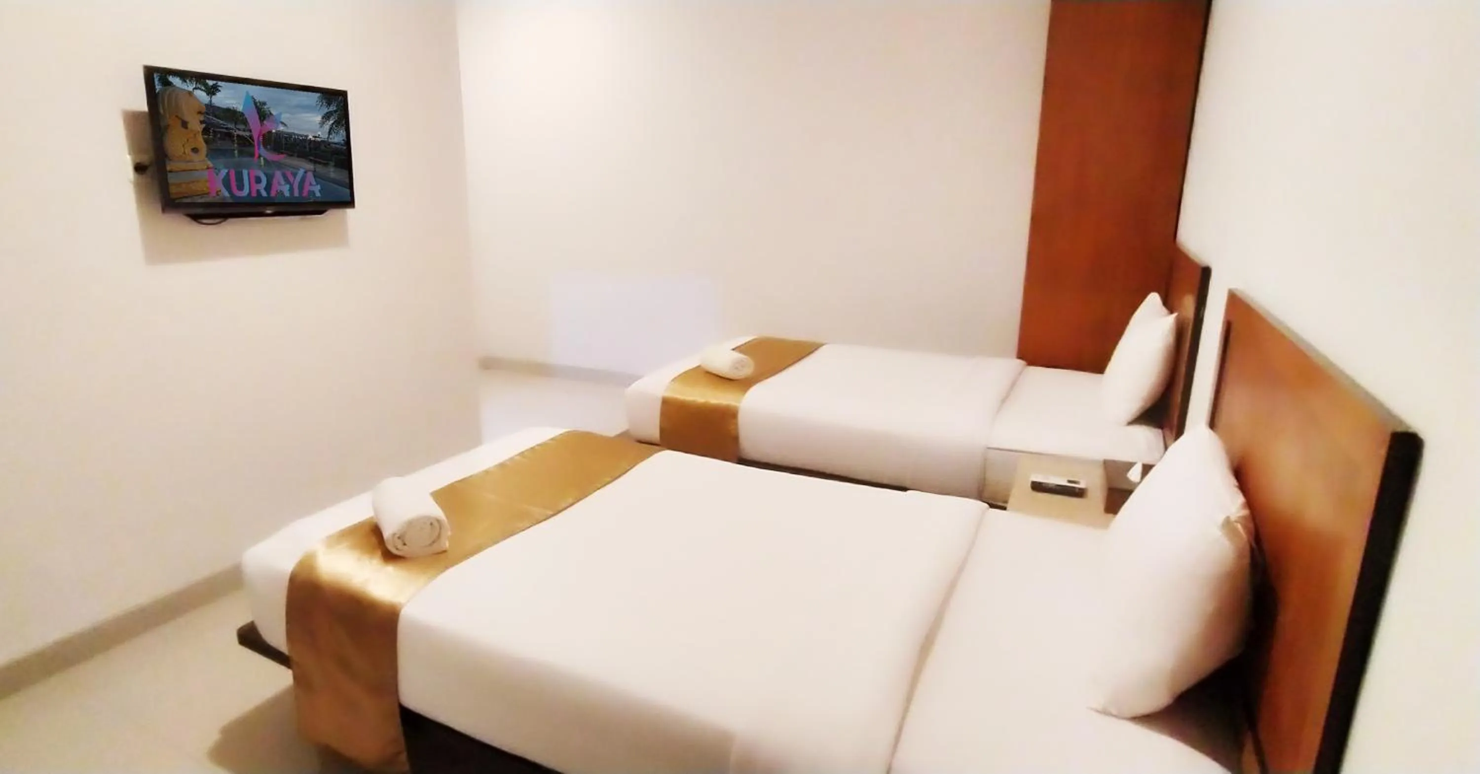 TV and multimedia, Bed in Kuraya Hotel Residence