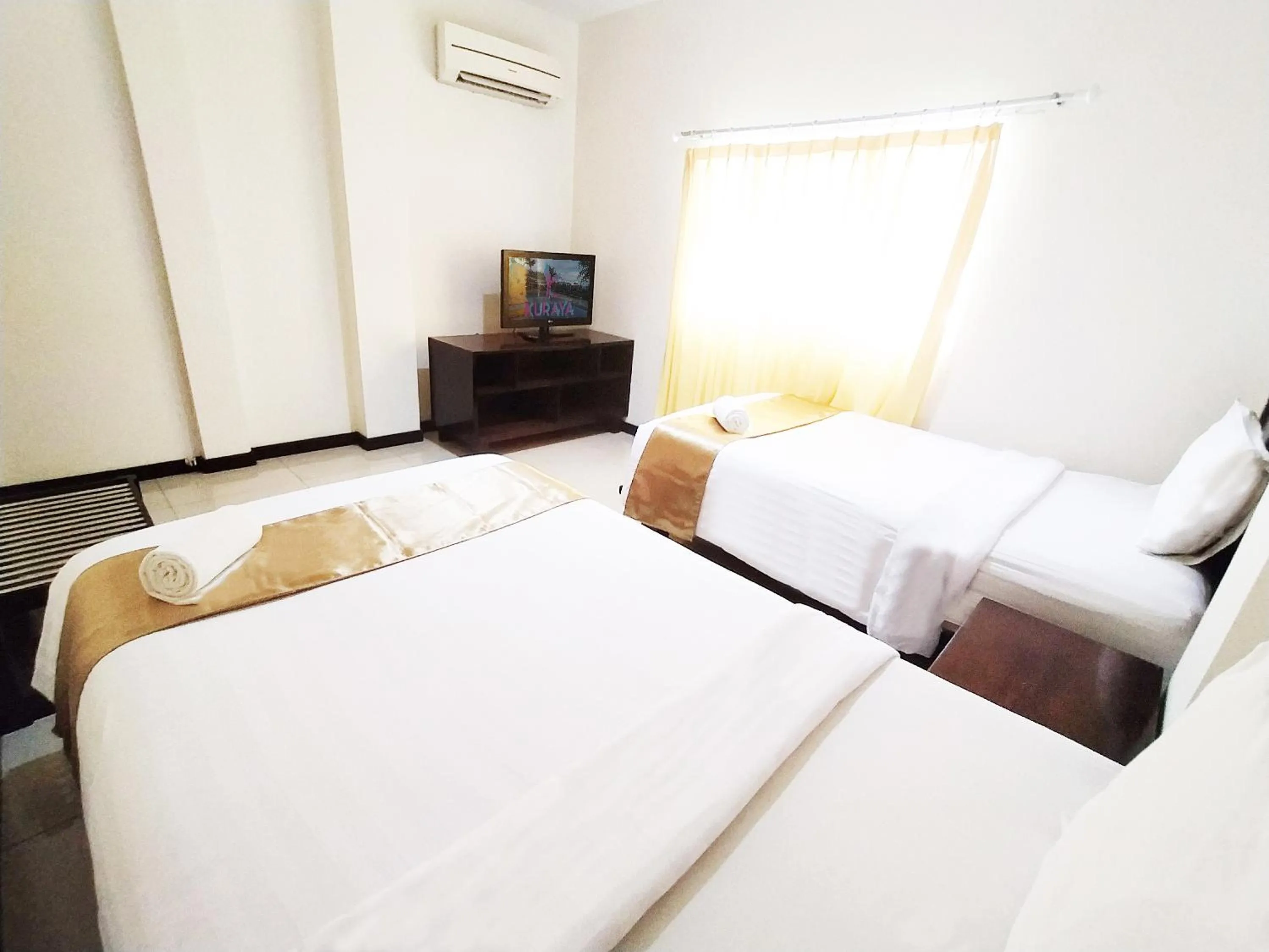 TV and multimedia, Bed in Kuraya Hotel Residence