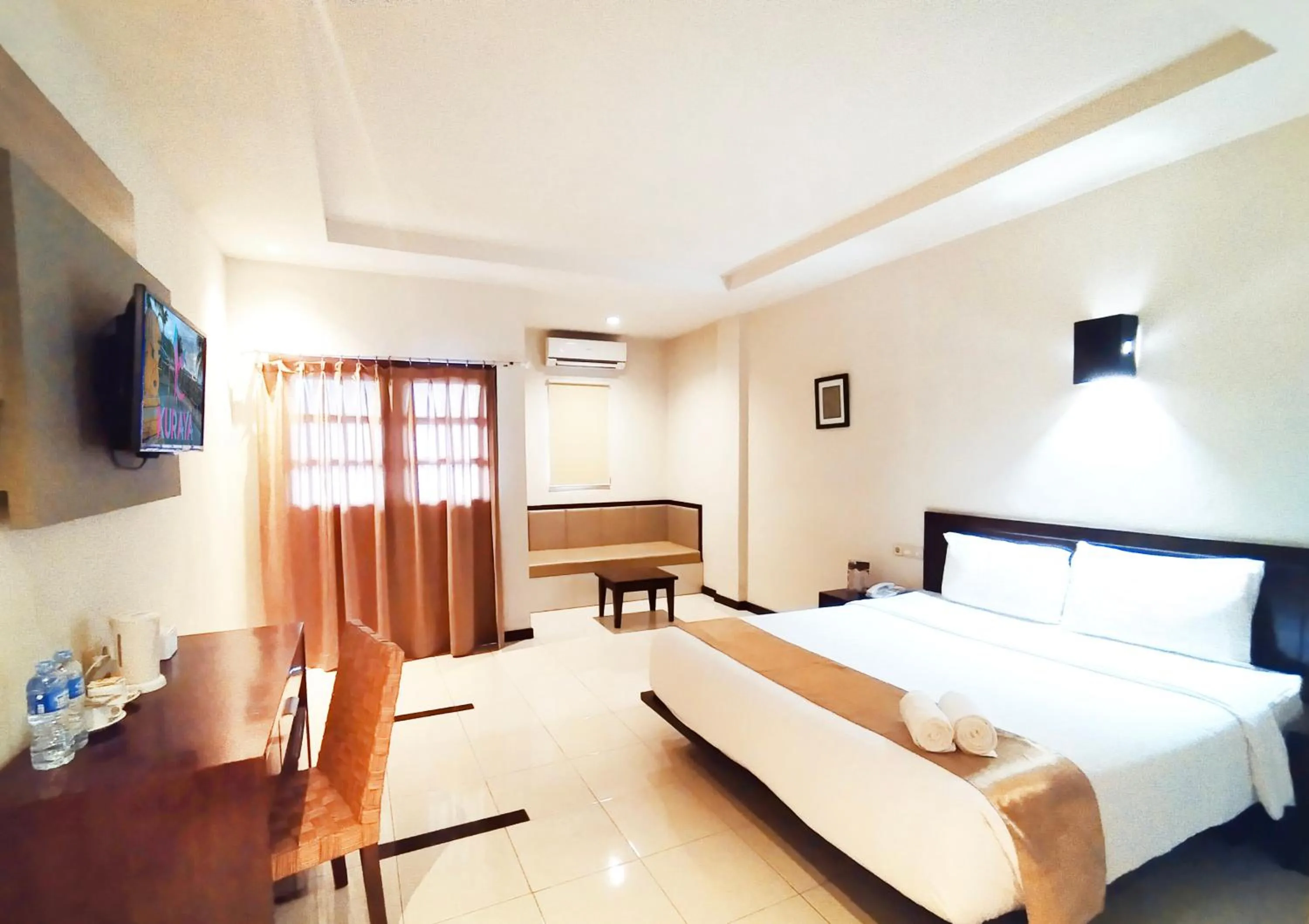 Bed in Kuraya Hotel Residence