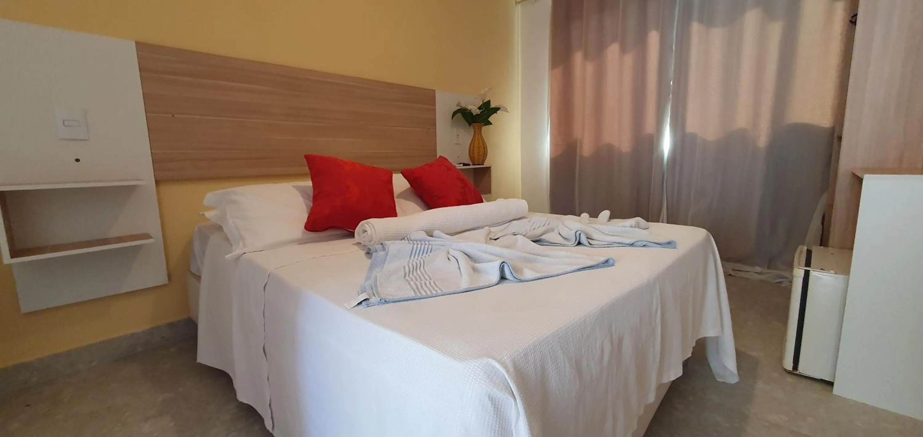 Bed in Pousada Terra Mar Way