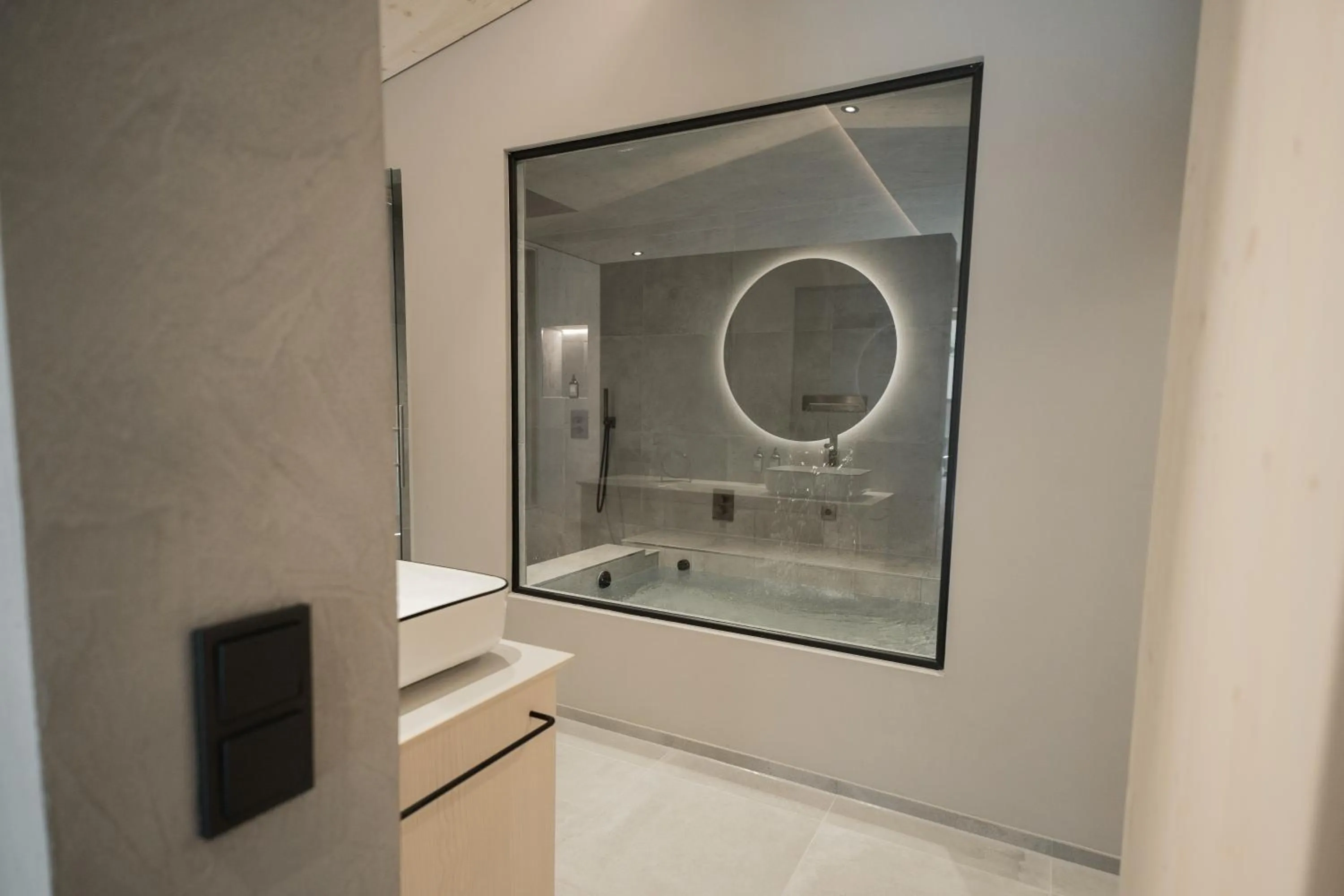 Shower in Amrai Suites