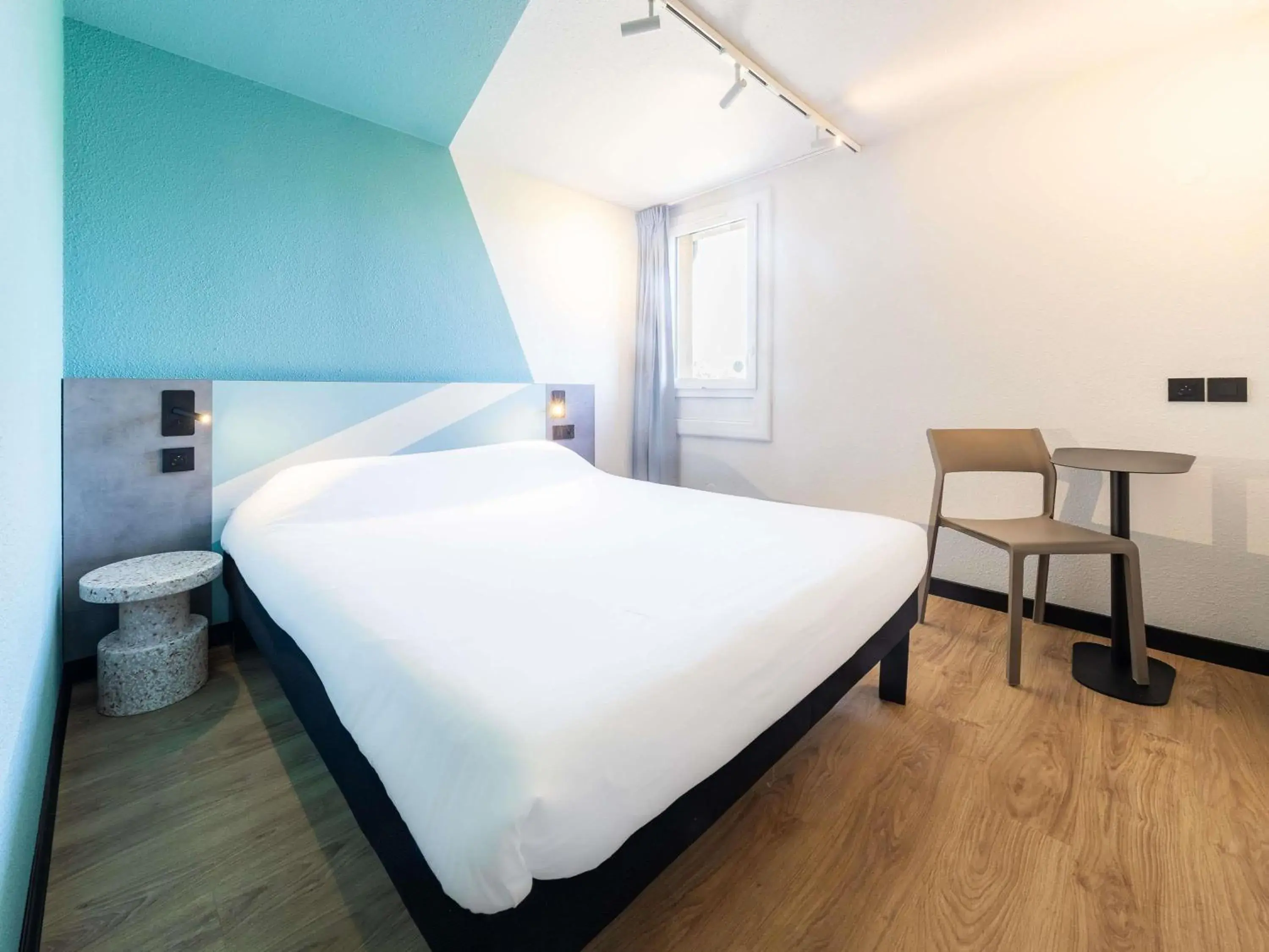 Bedroom, Bed in Ibis budget Béziers Est Mediterranée A9 / A75 Bedroom, Bed in Ibis budget Béziers Est Mediterranée A9 / A75