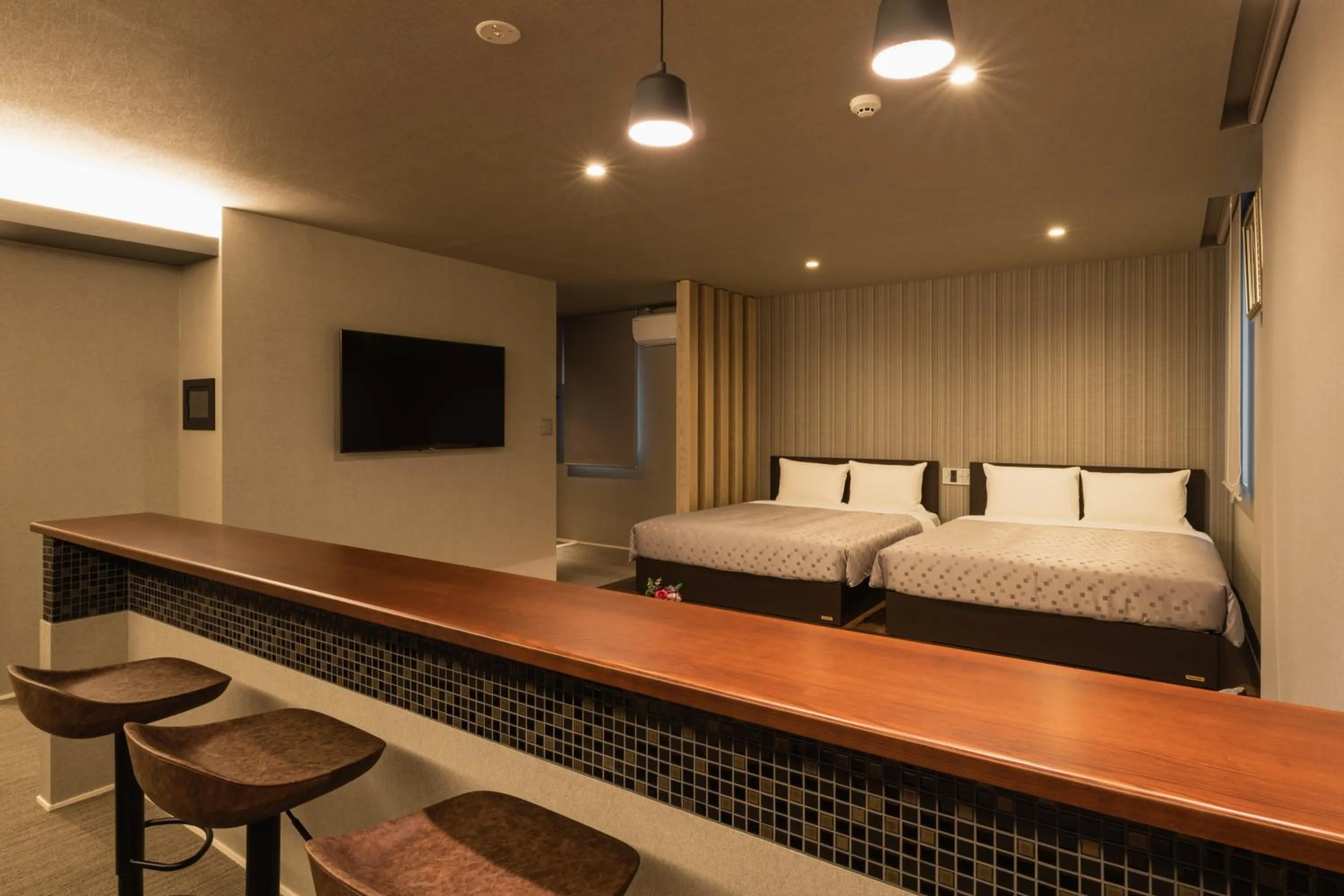 Photo of the whole room, Bed in GRAND BASE Hakata Station